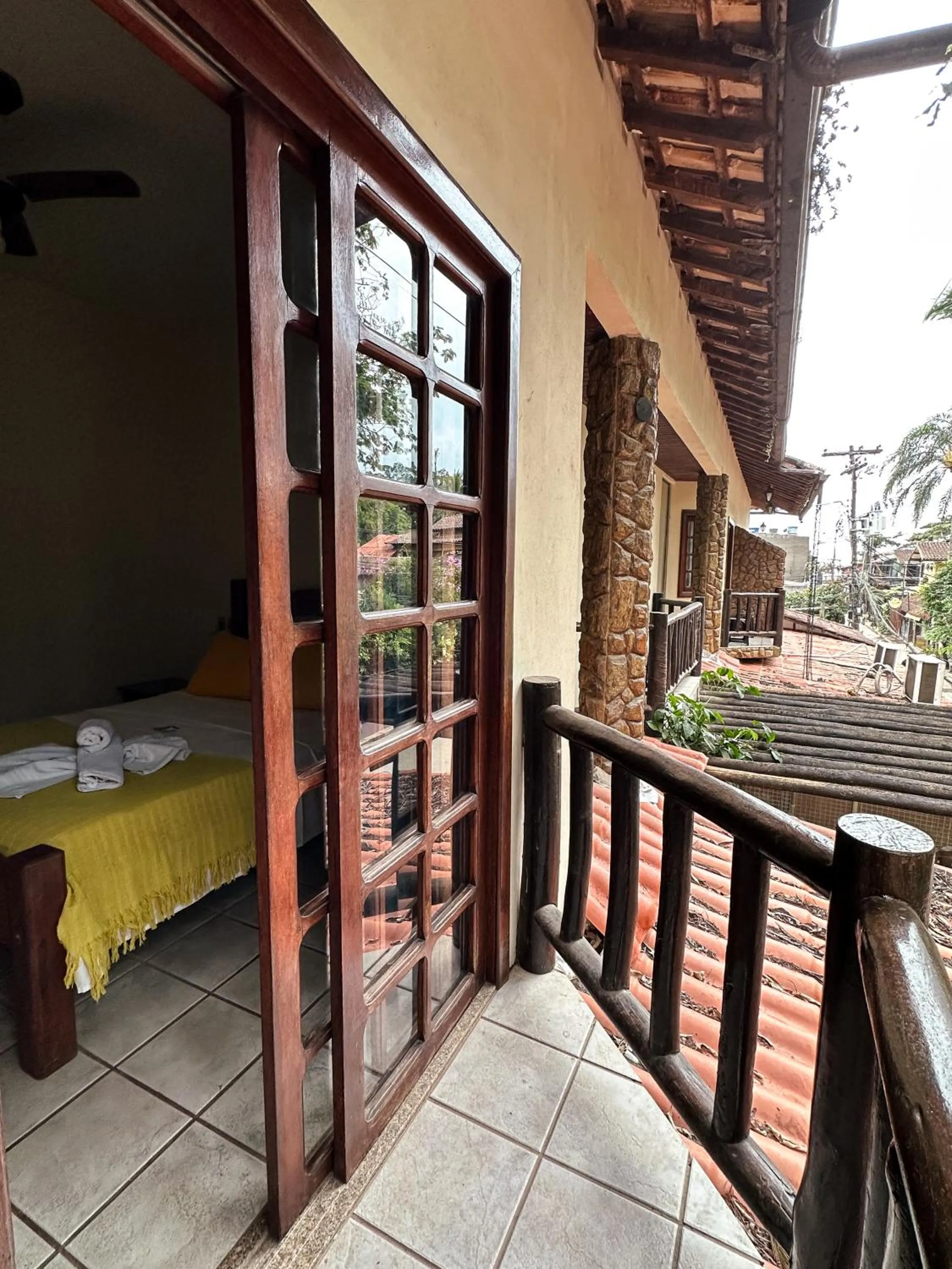 Bed in Pousada Sanhaço