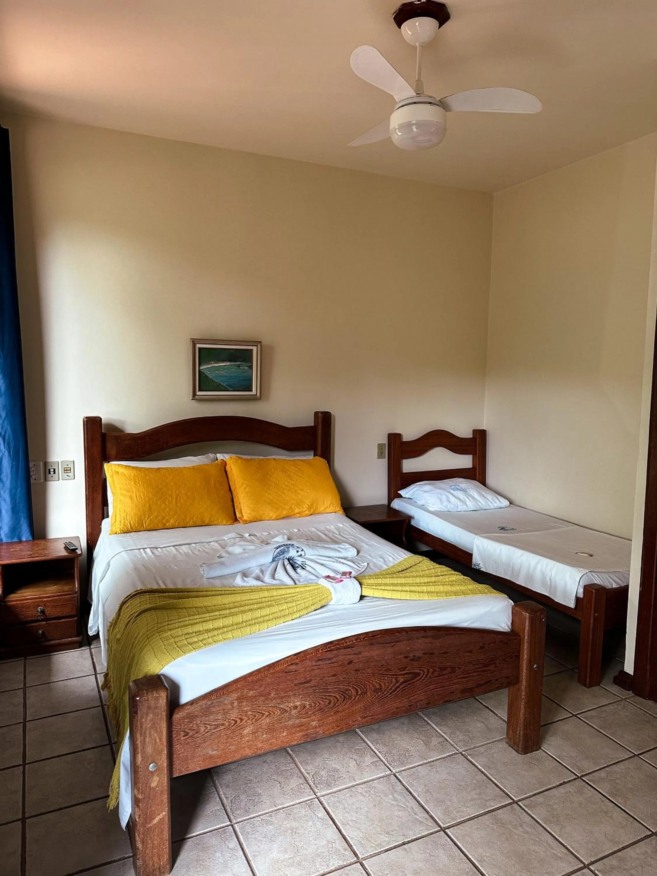 Bed in Pousada Sanhaço