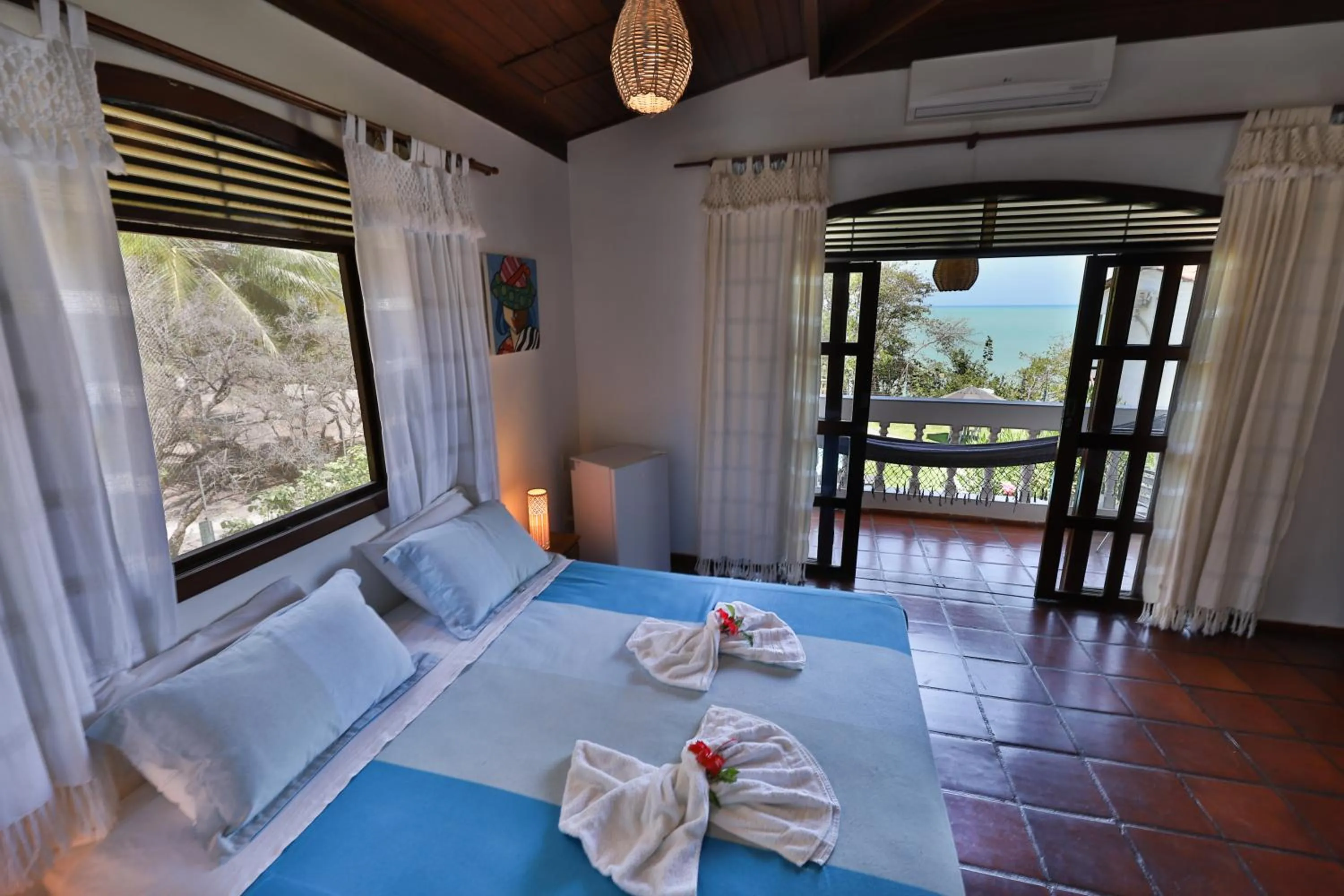 Bed in Pousada Enseada Dos Golfinhos