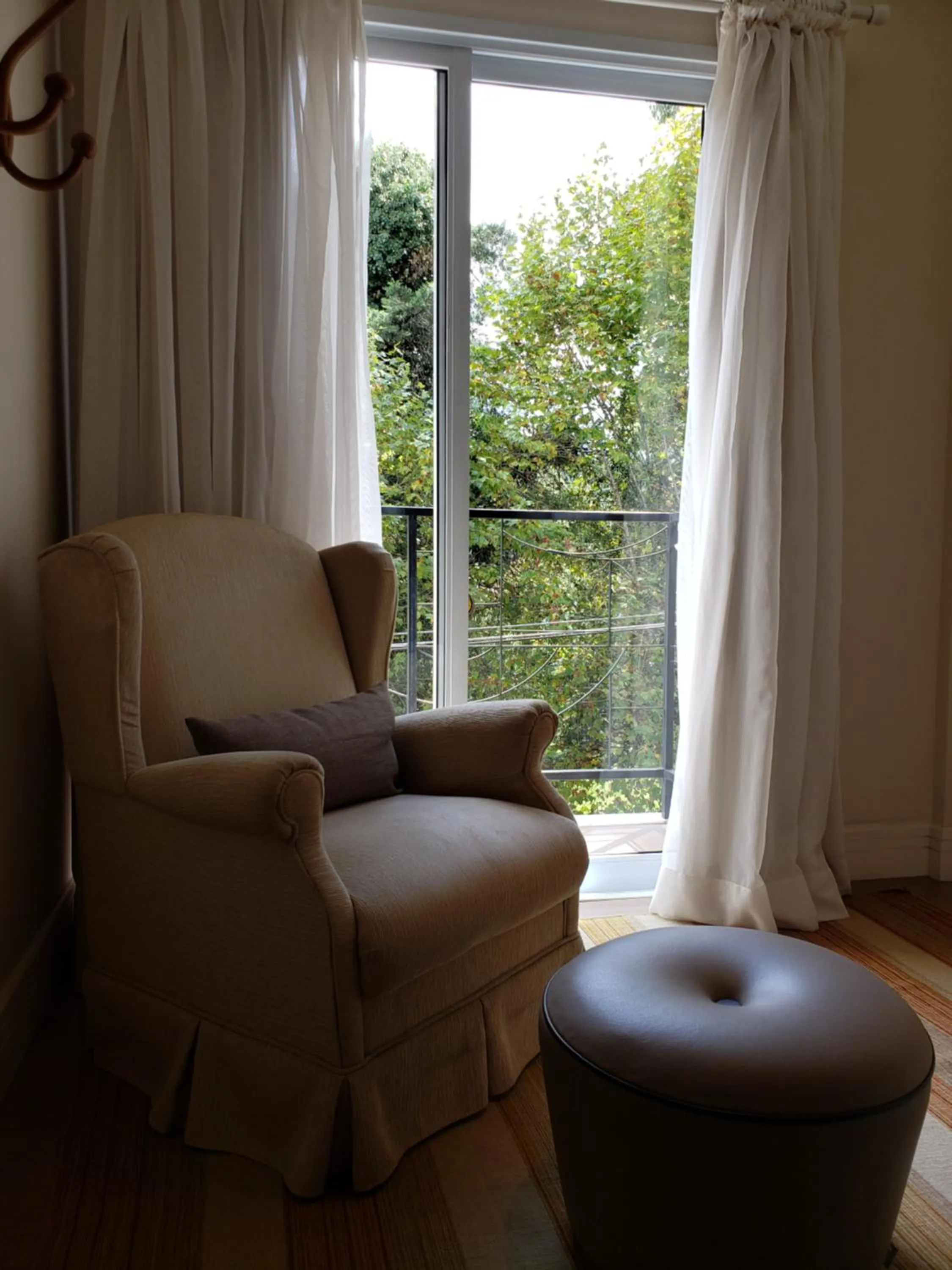 Living room in Pousada Annecy - CAPIVARI Fácil acesso ao centrinho e Baden Bar