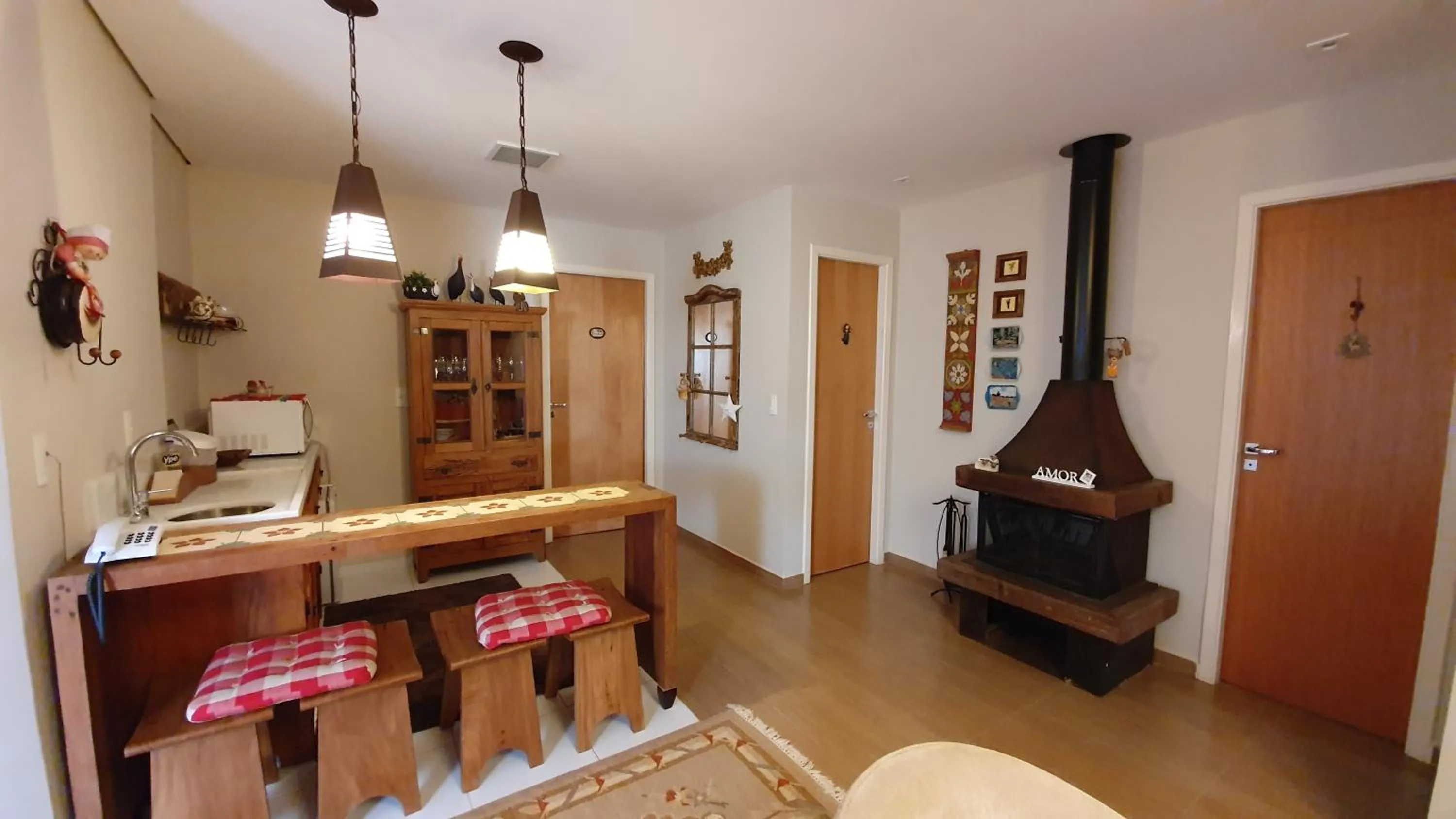 Kitchen or kitchenette in Pousada Annecy - CAPIVARI Fácil acesso ao centrinho e Baden Bar