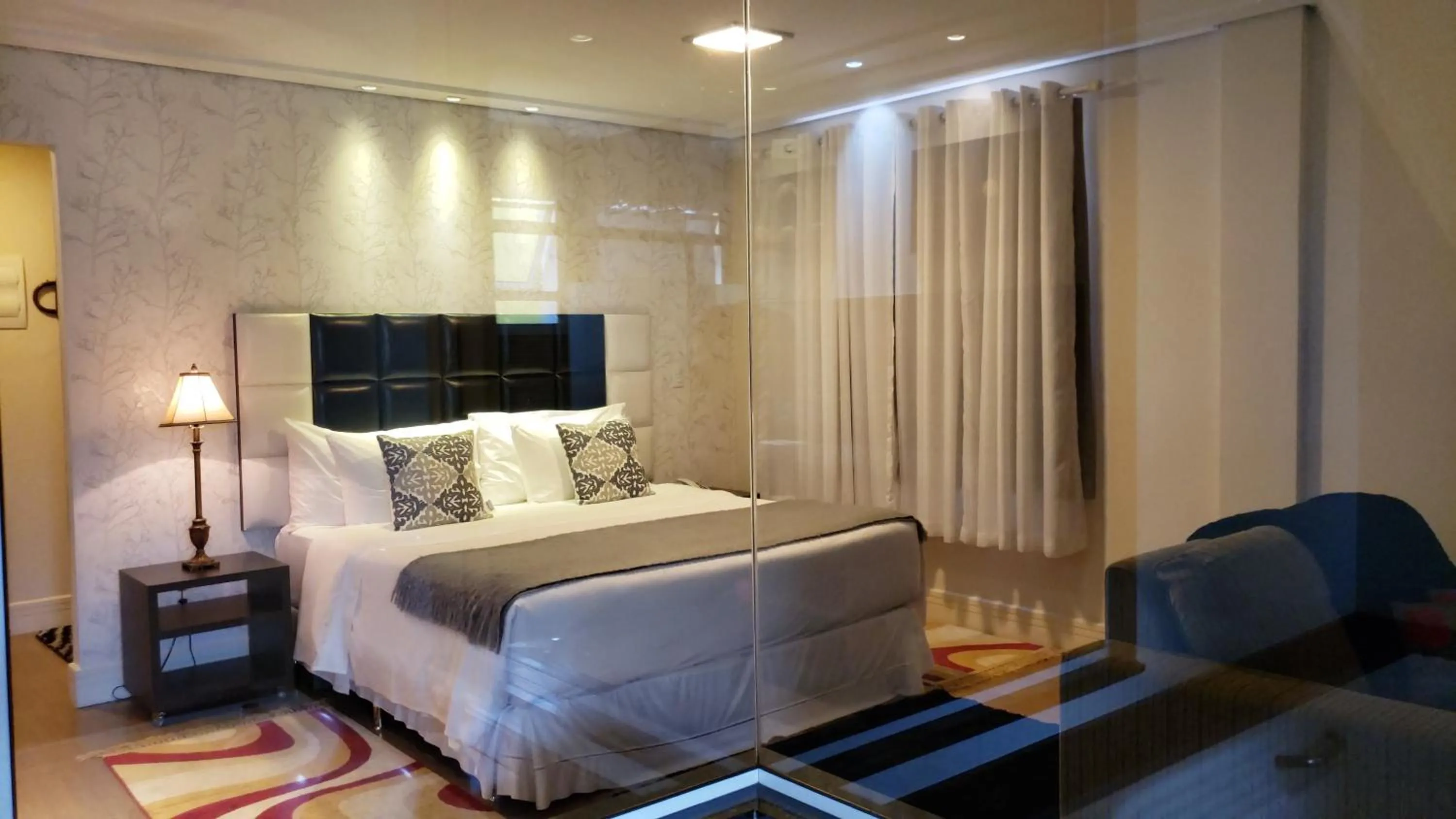 Bed in Pousada Annecy - CAPIVARI Fácil acesso ao centrinho e Baden Bar