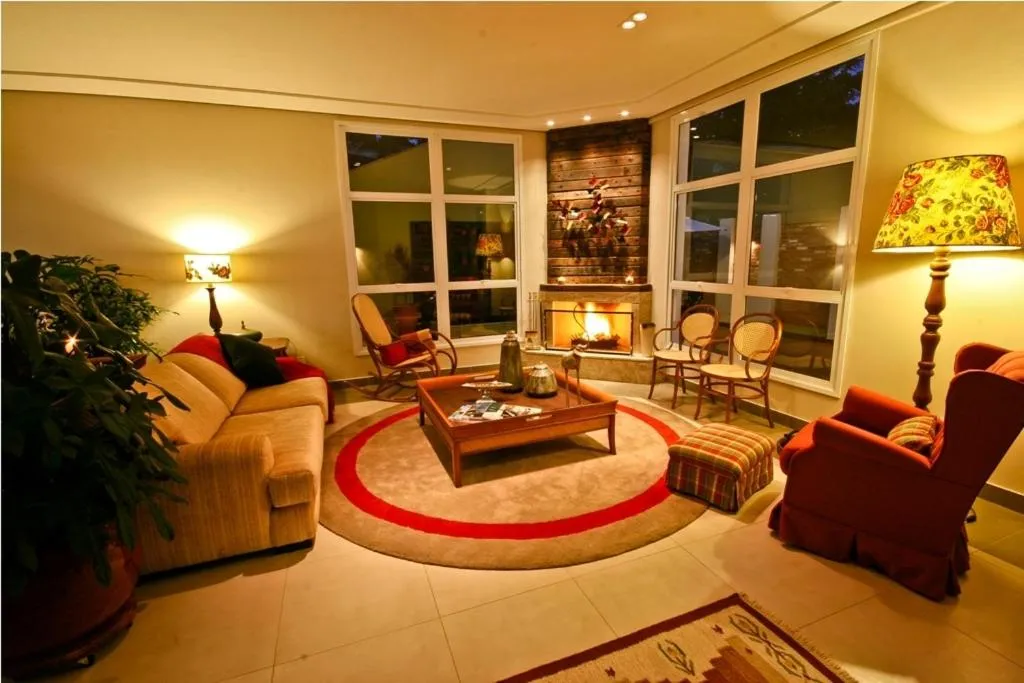 Living room in Pousada Annecy - CAPIVARI Fácil acesso ao centrinho e Baden Bar