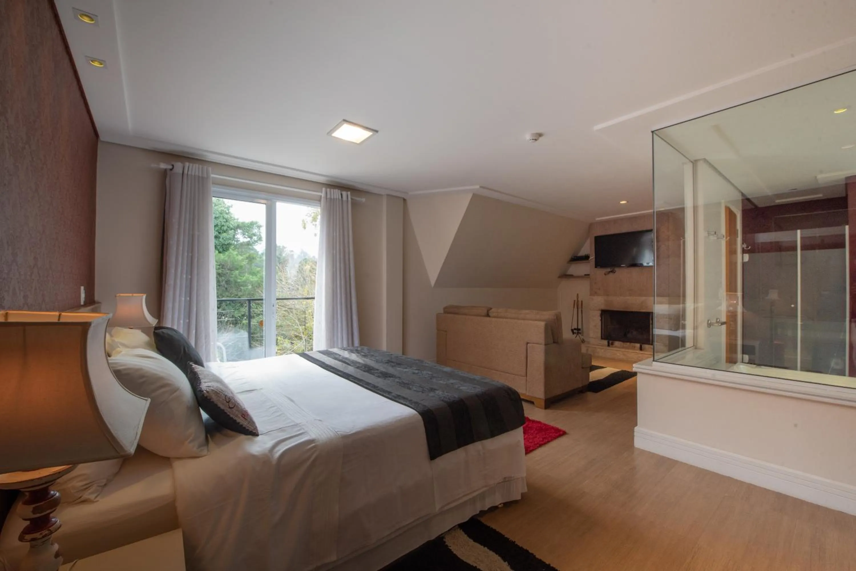 Bed in Pousada Annecy - CAPIVARI Fácil acesso ao centrinho e Baden Bar