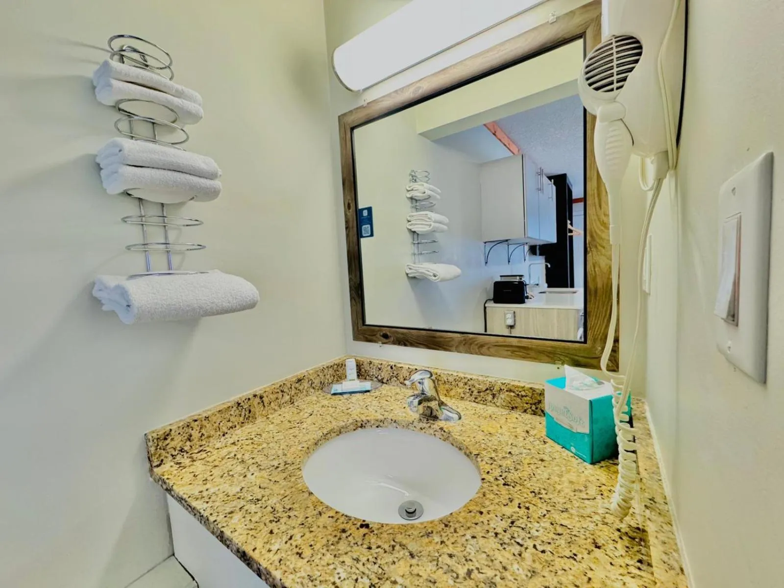 Bathroom in Travelodge by Wyndham Golden Sportsman Lodge