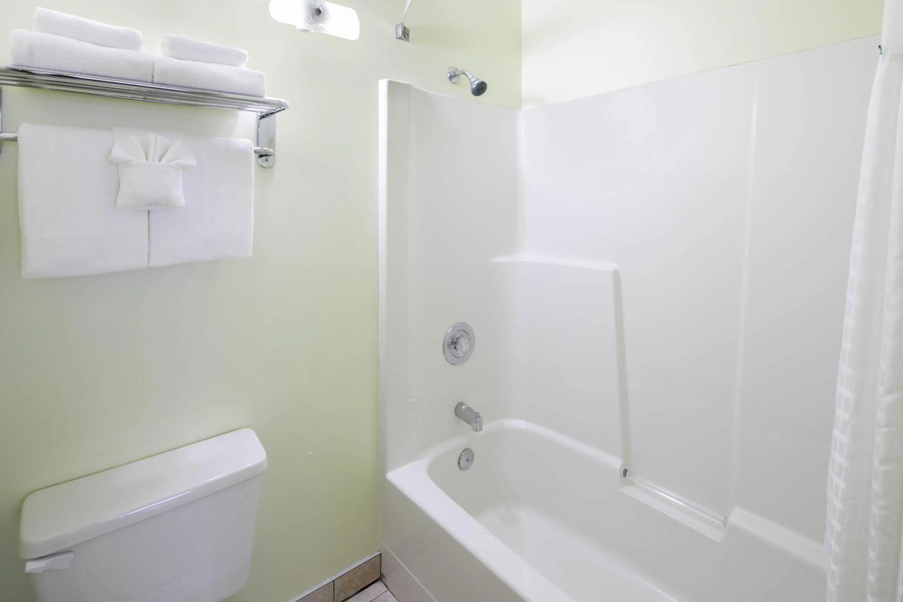 Bathroom in Travelodge by Wyndham Golden Sportsman Lodge