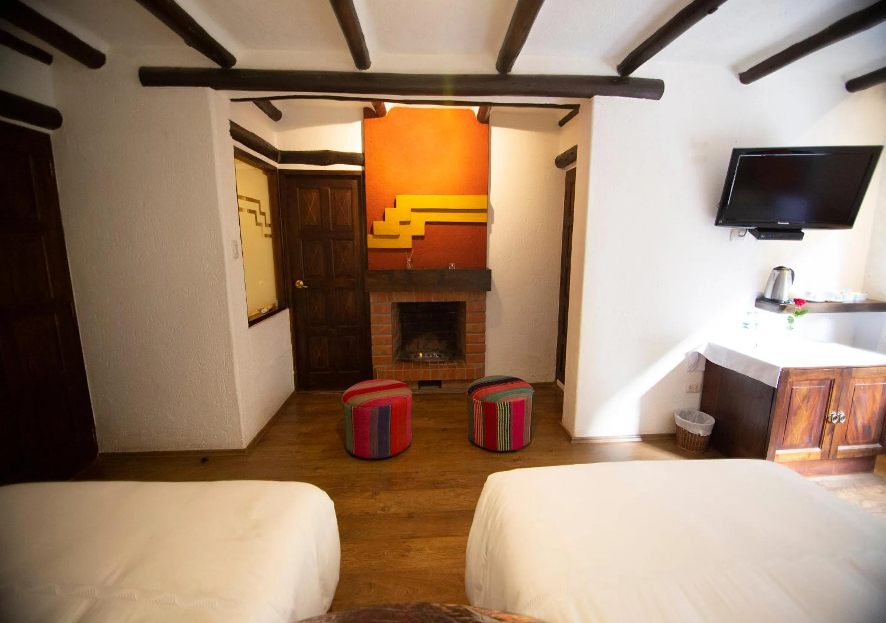 Seating area, Bed in Hatun Inti Boutique