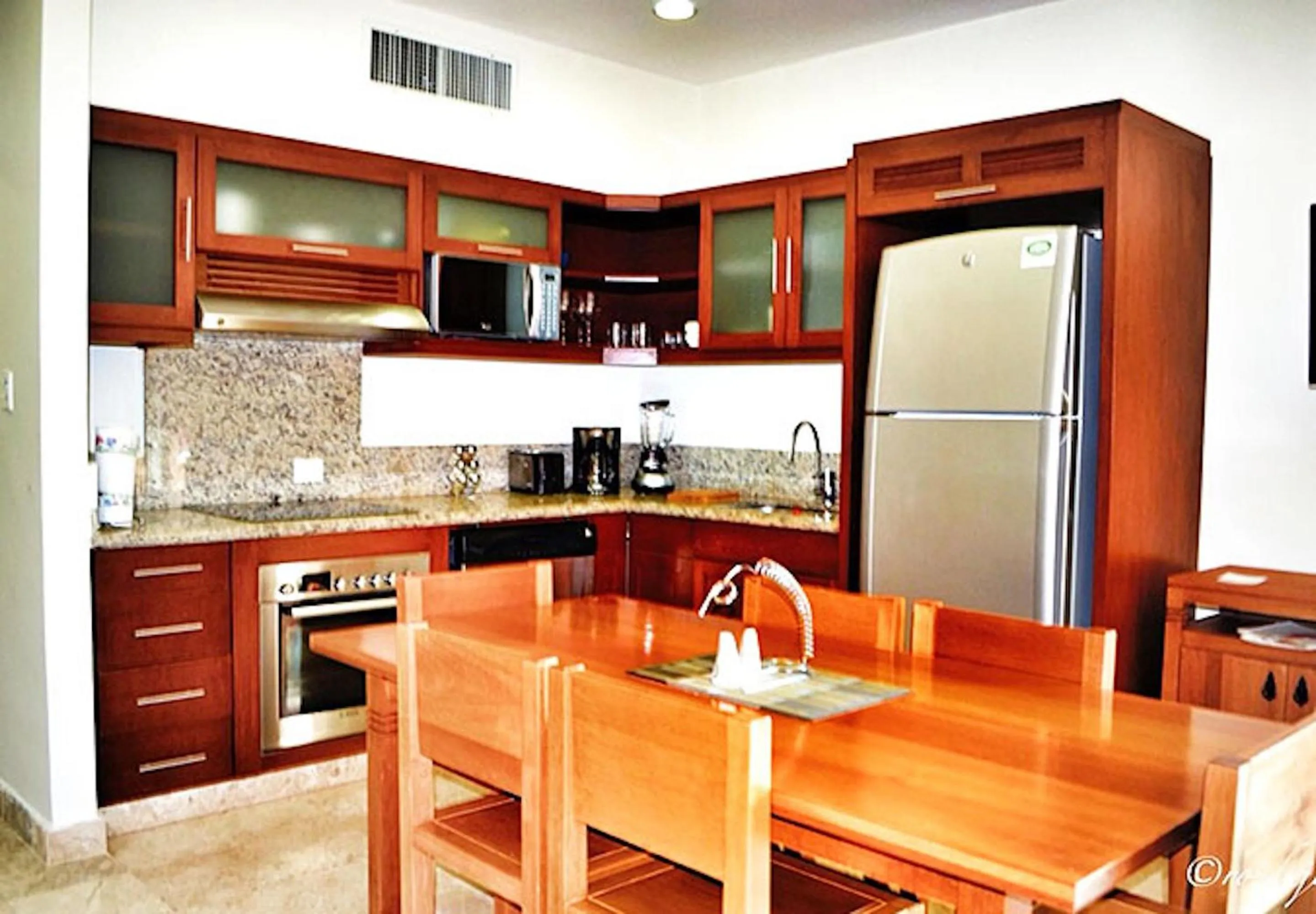 Kitchen or kitchenette in Acanto Hotel Playa del Carmen, Trademark Collection by Wyndham