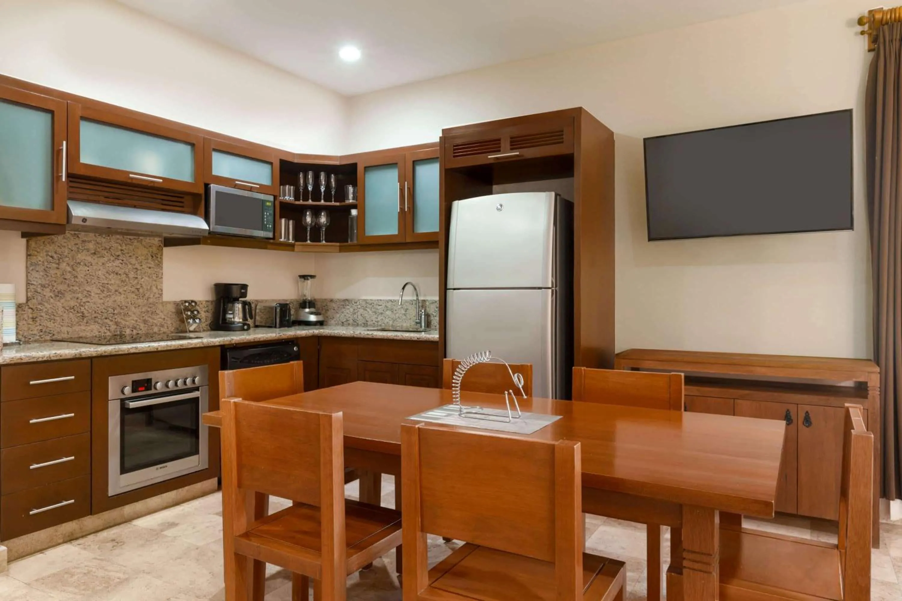 Kitchen or kitchenette in Acanto Hotel Playa del Carmen, Trademark Collection by Wyndham