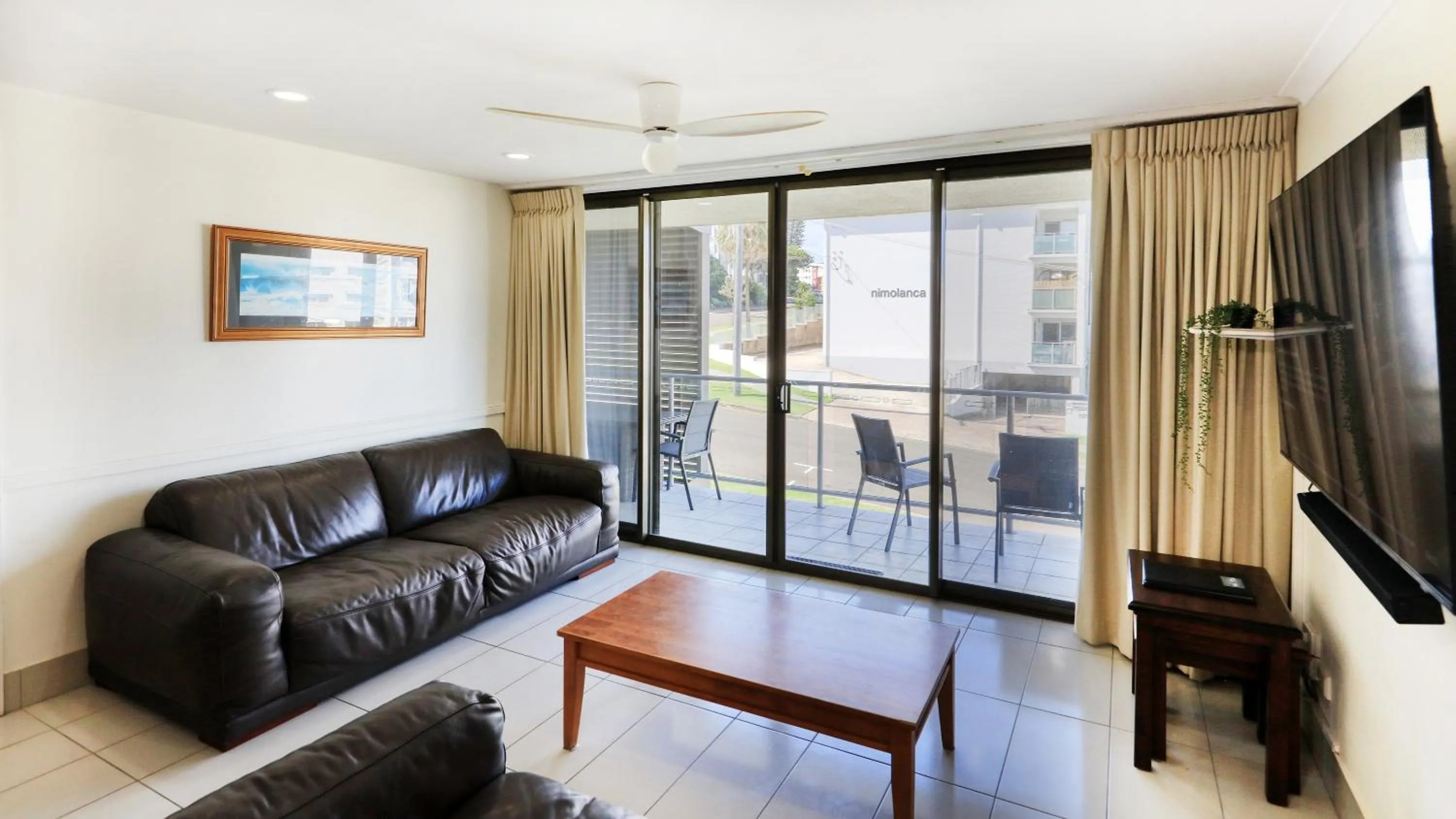 Living room in Merrima Court Holidays