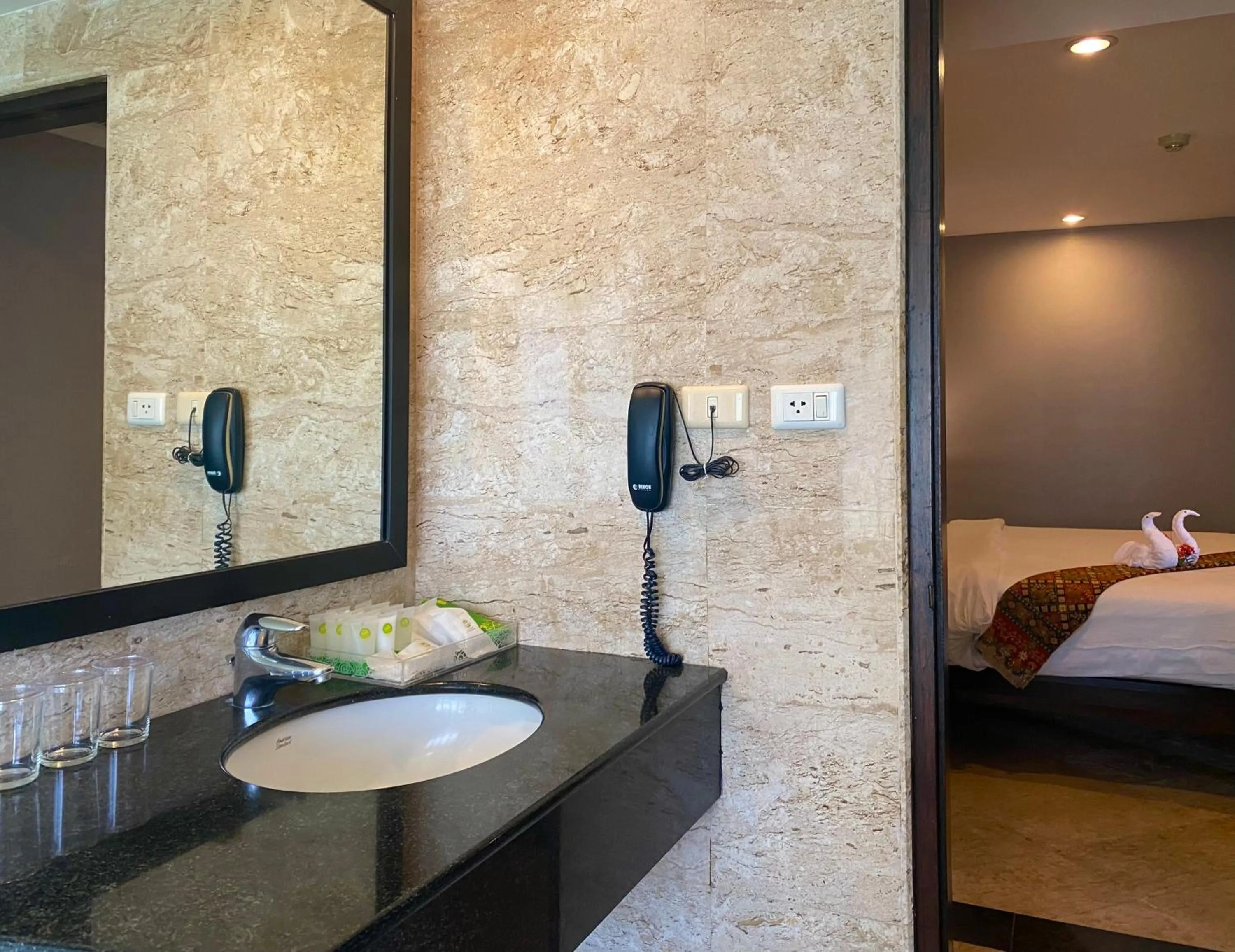 Bathroom, Bed in C & N Resort and Spa - SHA Extra Plus