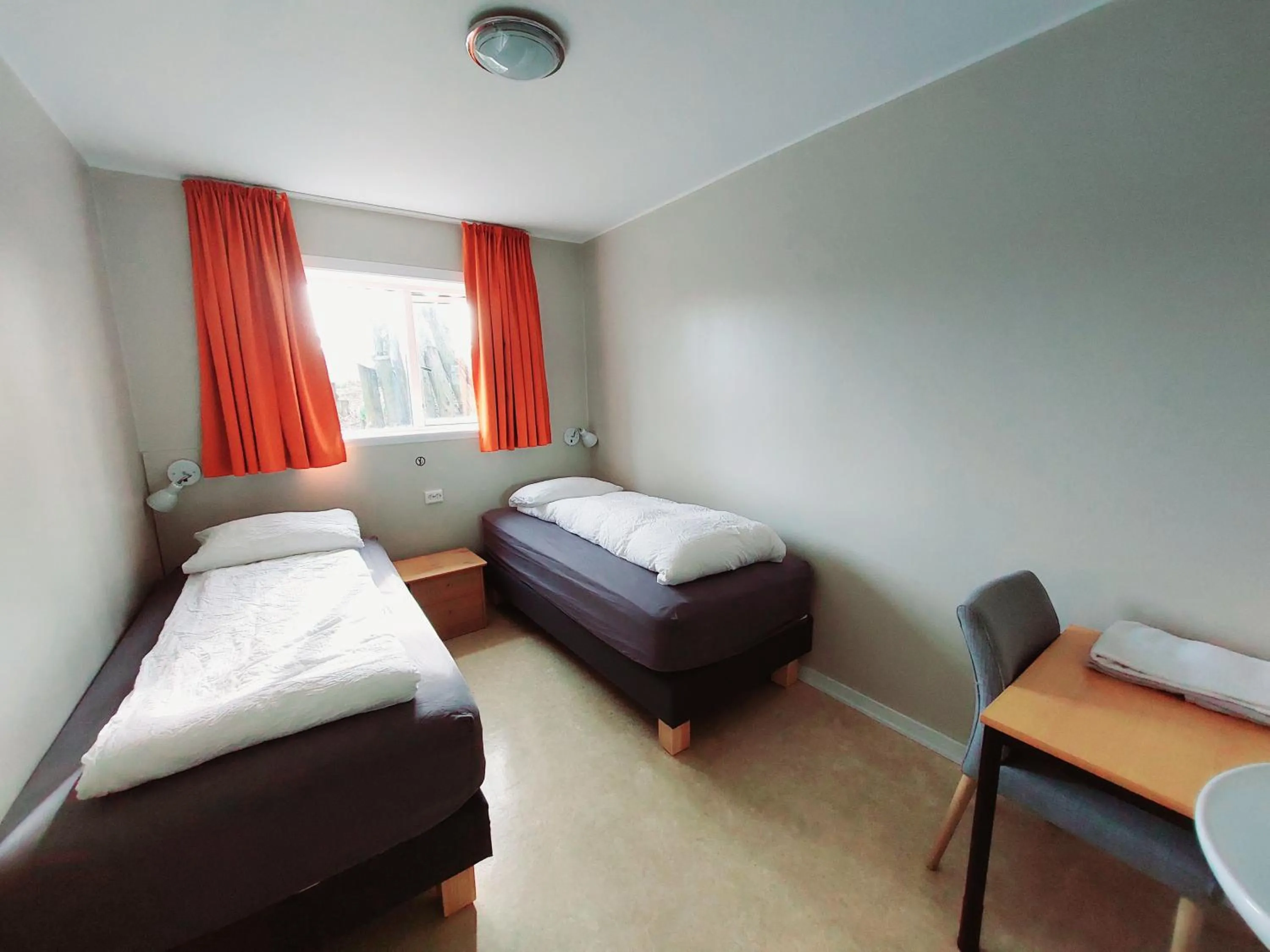 Bed in Igdlo Guesthouse