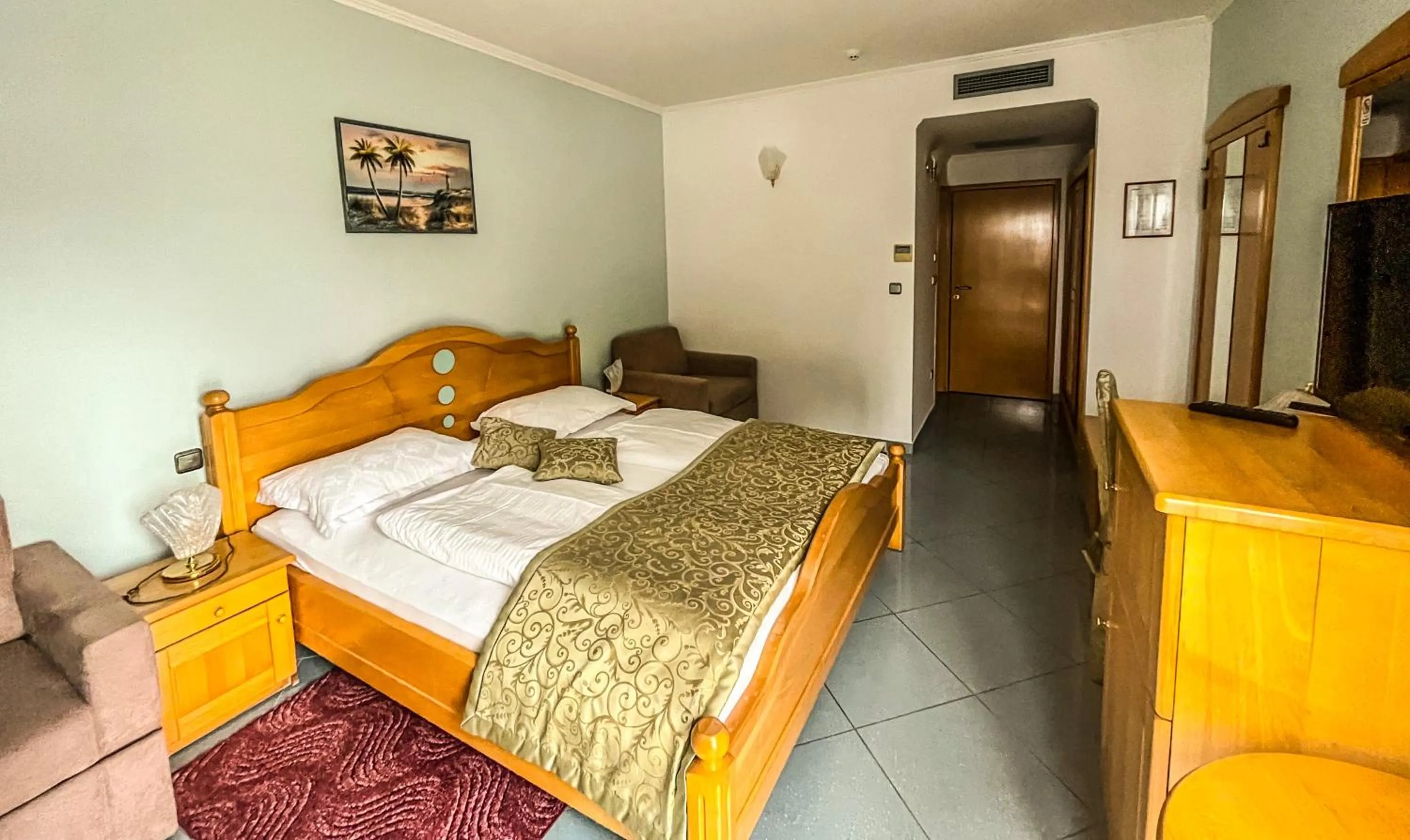 Bed in Hotel Miramare