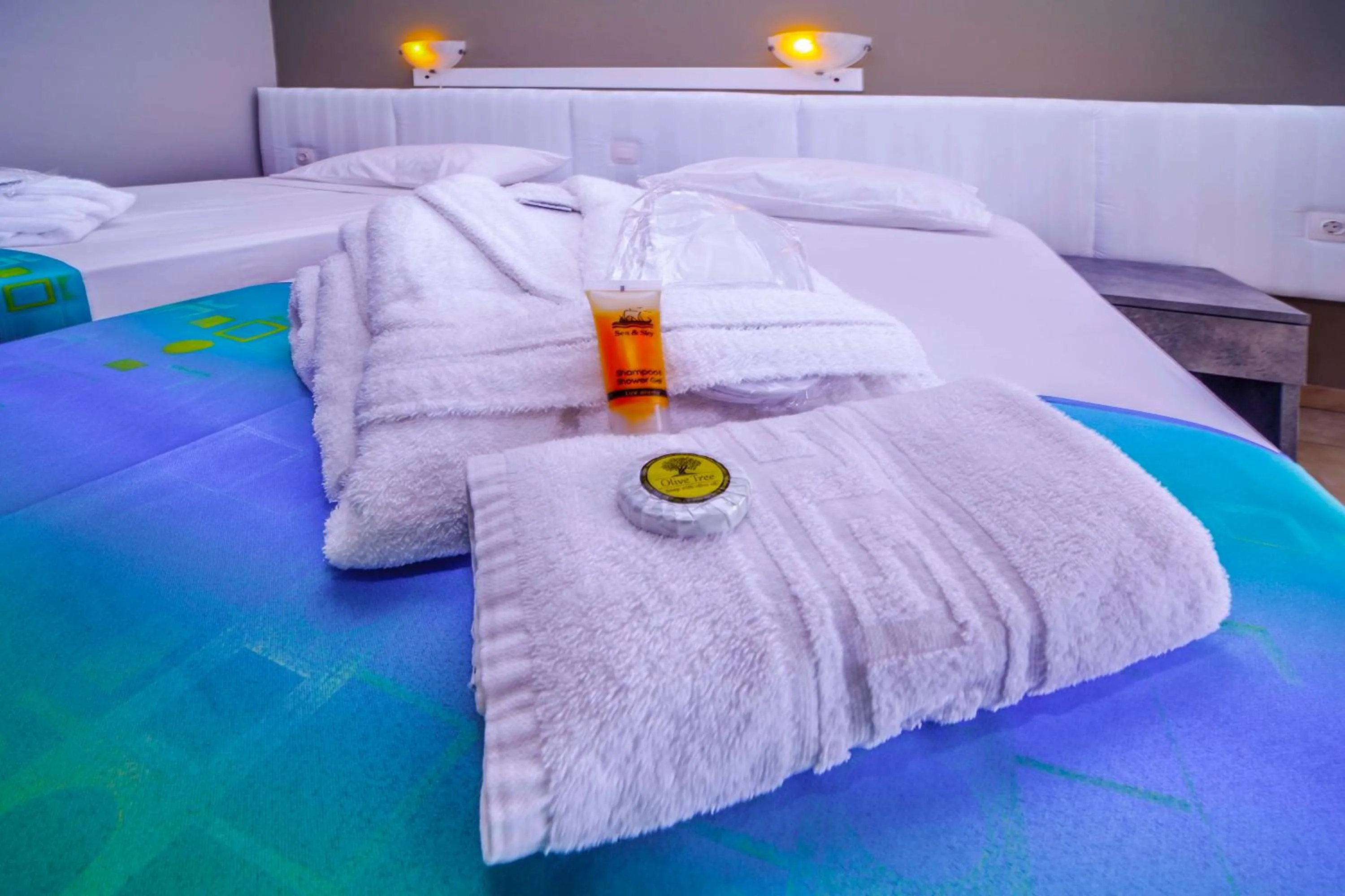 towels, Bed in Lito Hotel