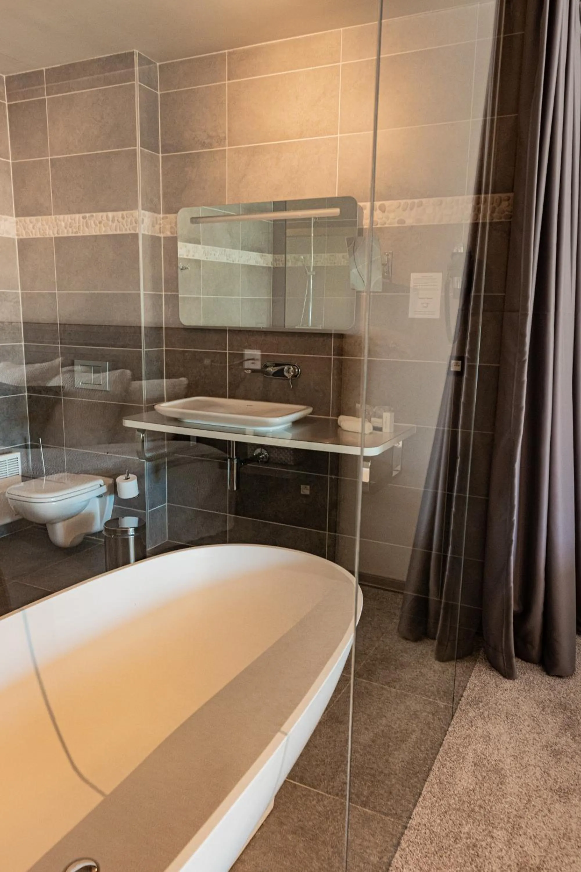 Bathroom in Abalona Hotel & Apartments