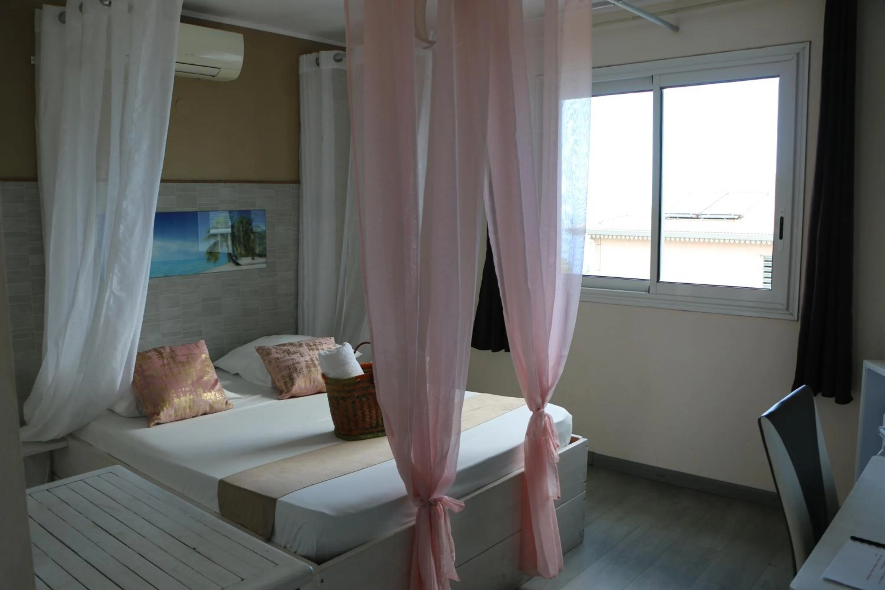 Bed in Hôtel Le Soleil Couchant