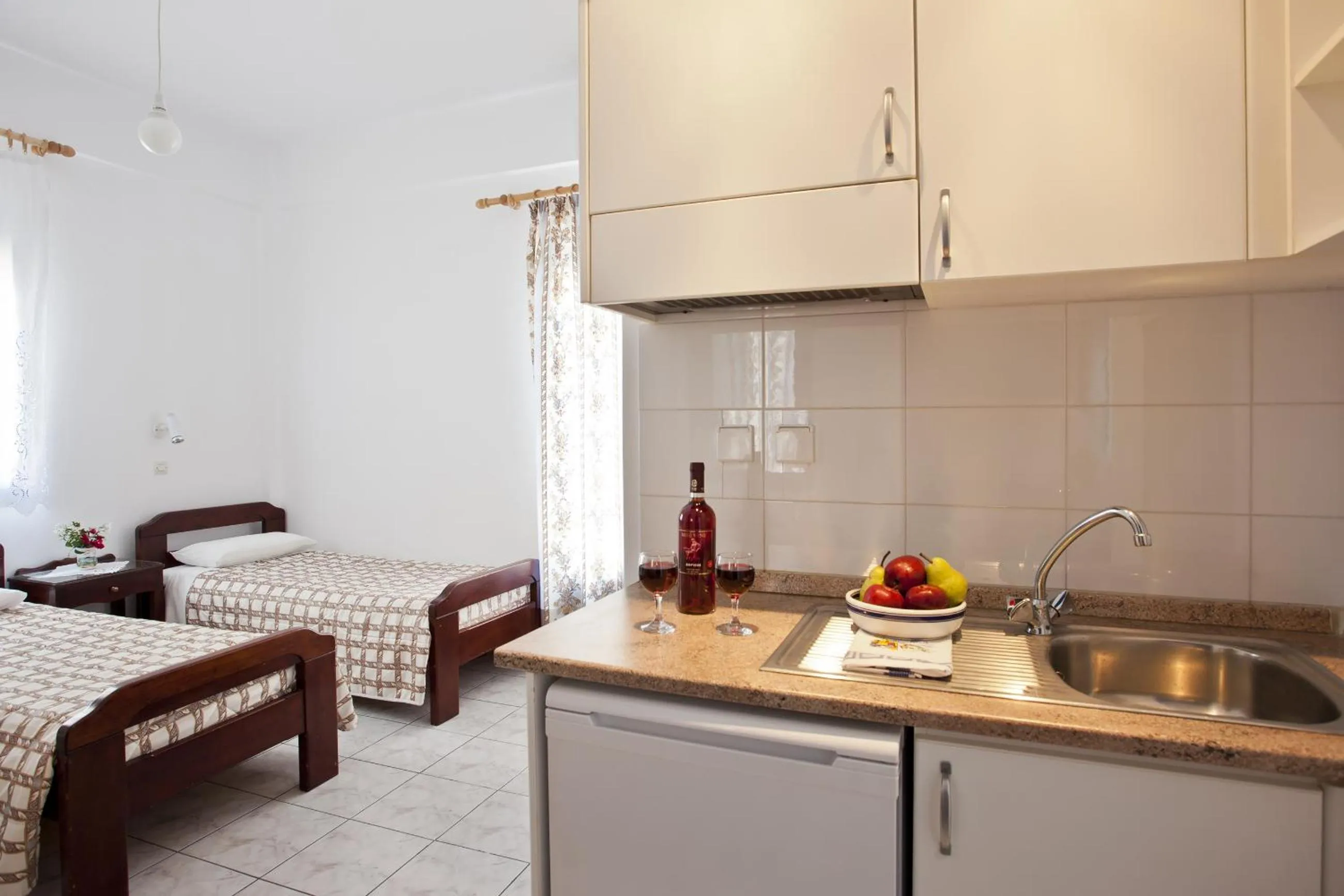 Kitchen or kitchenette, Bed in Ancient Thera Studios