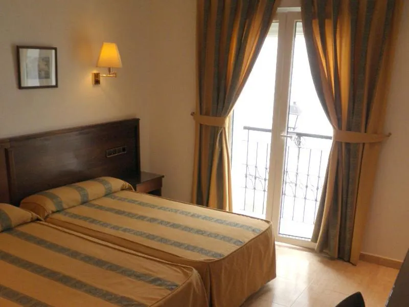 Bed in Hotel Tio Felipe