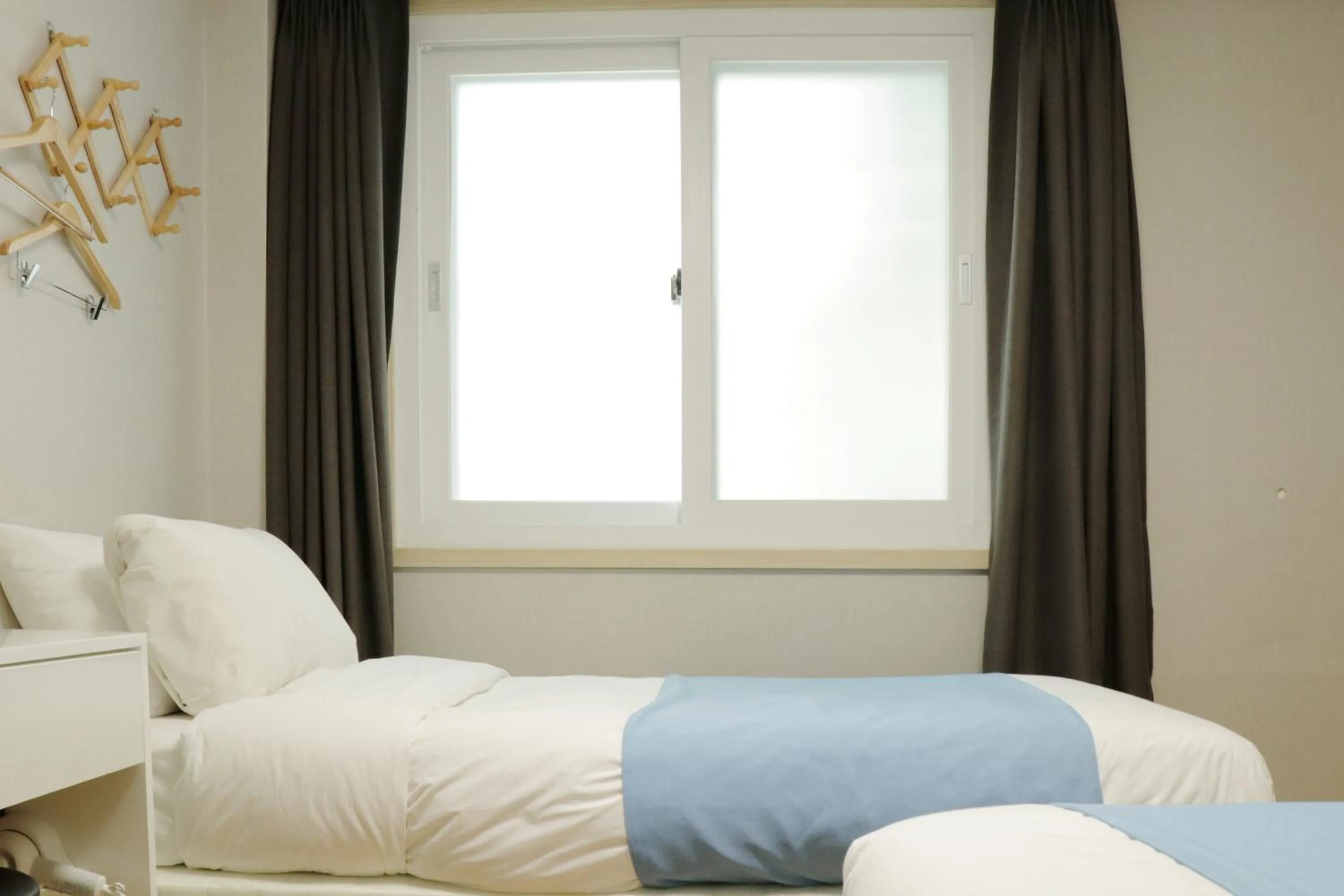 Bed in Ora Stay Hotel