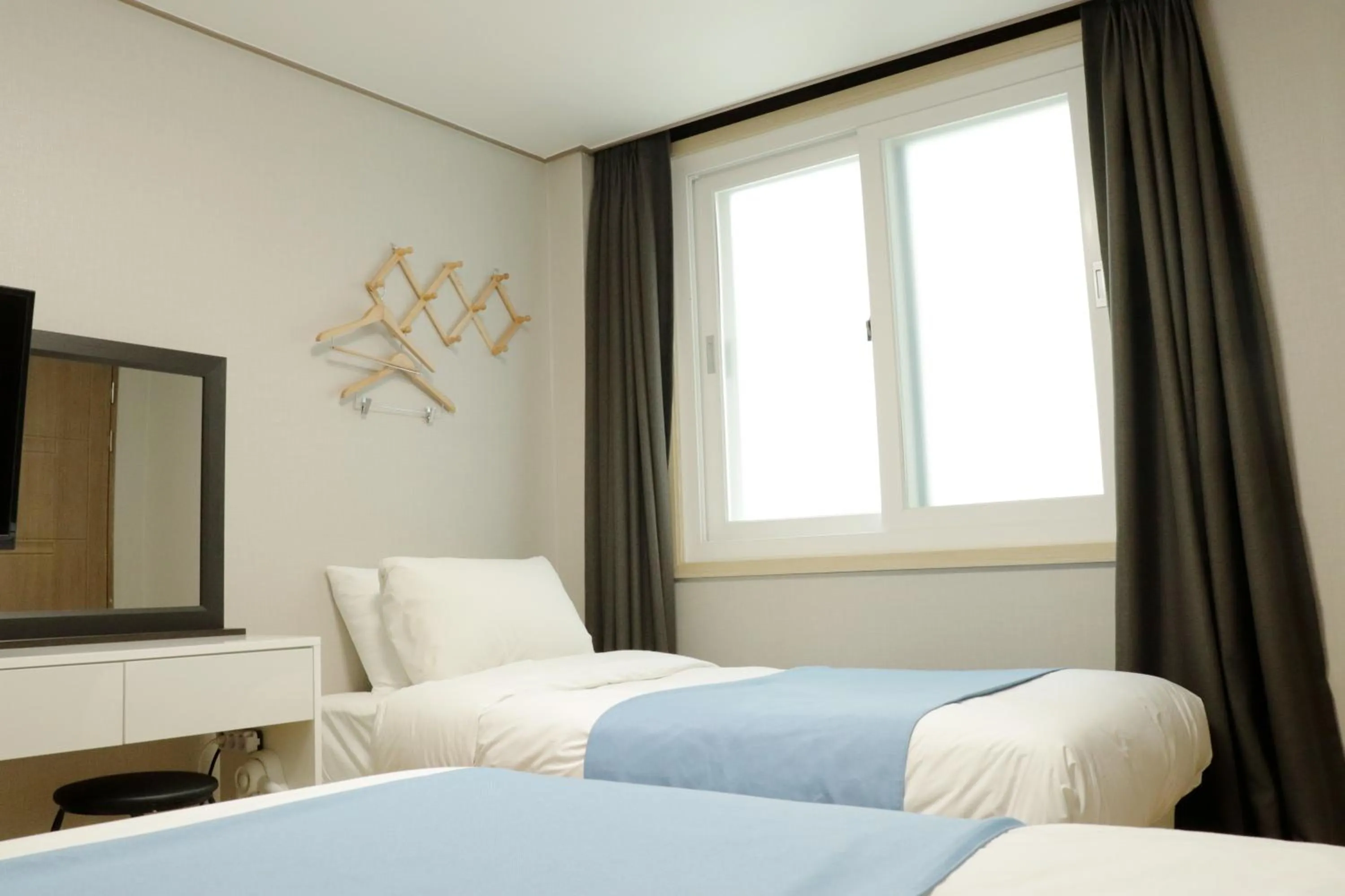 Bed in Ora Stay Hotel