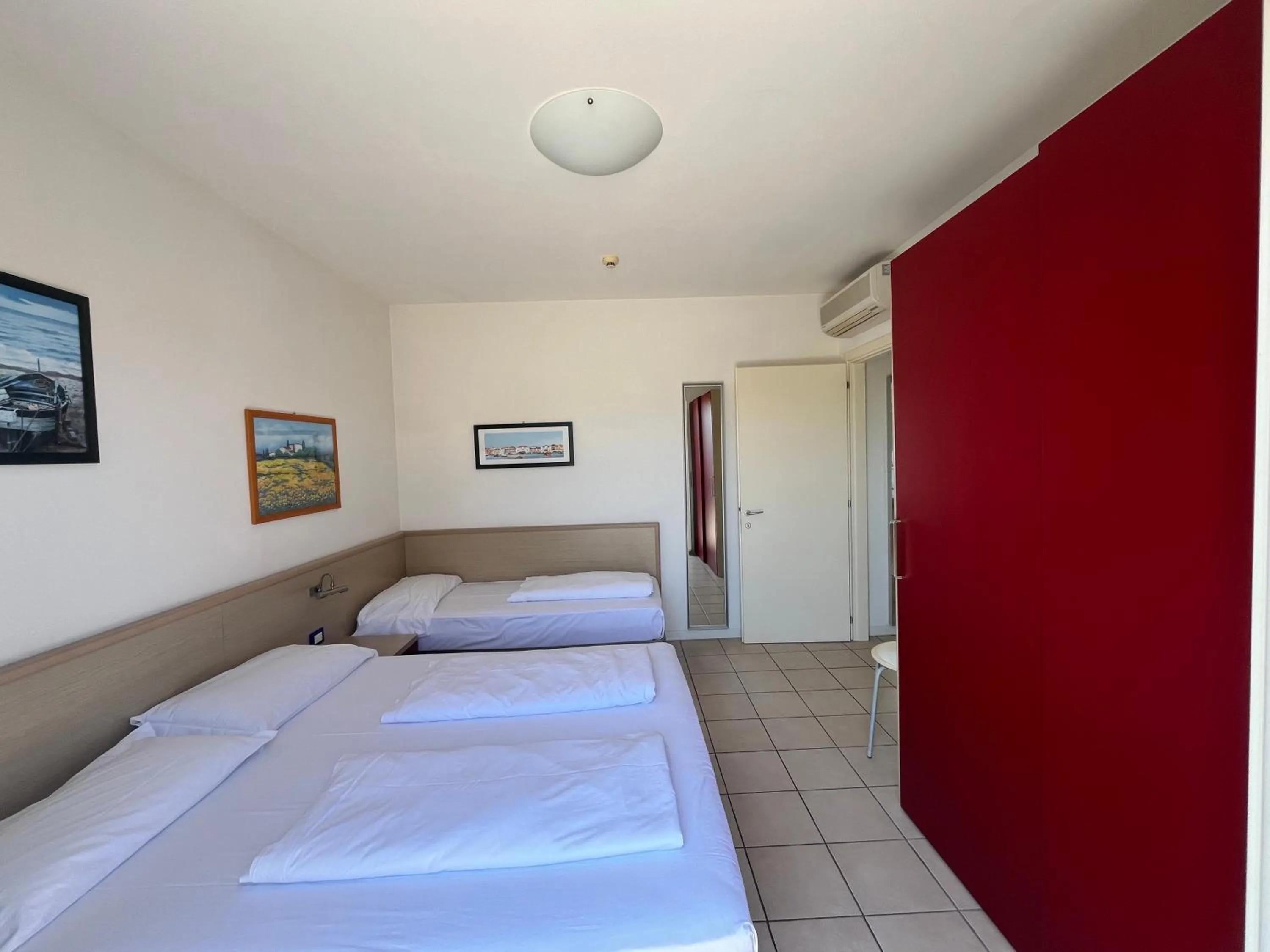 Bed in Villaggio Hemingway - Family Aparthotel