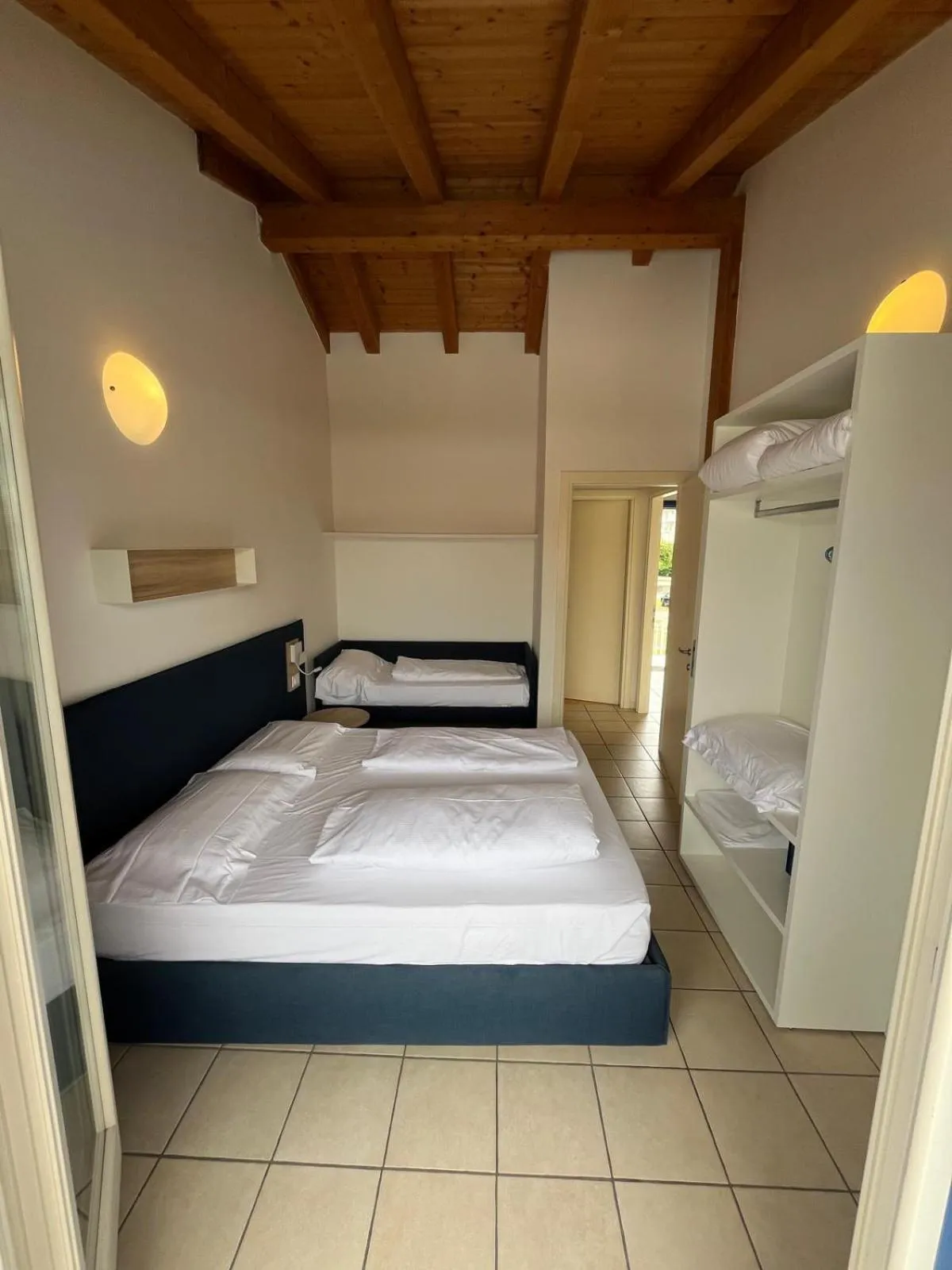 Bed in Villaggio Hemingway - Family Aparthotel