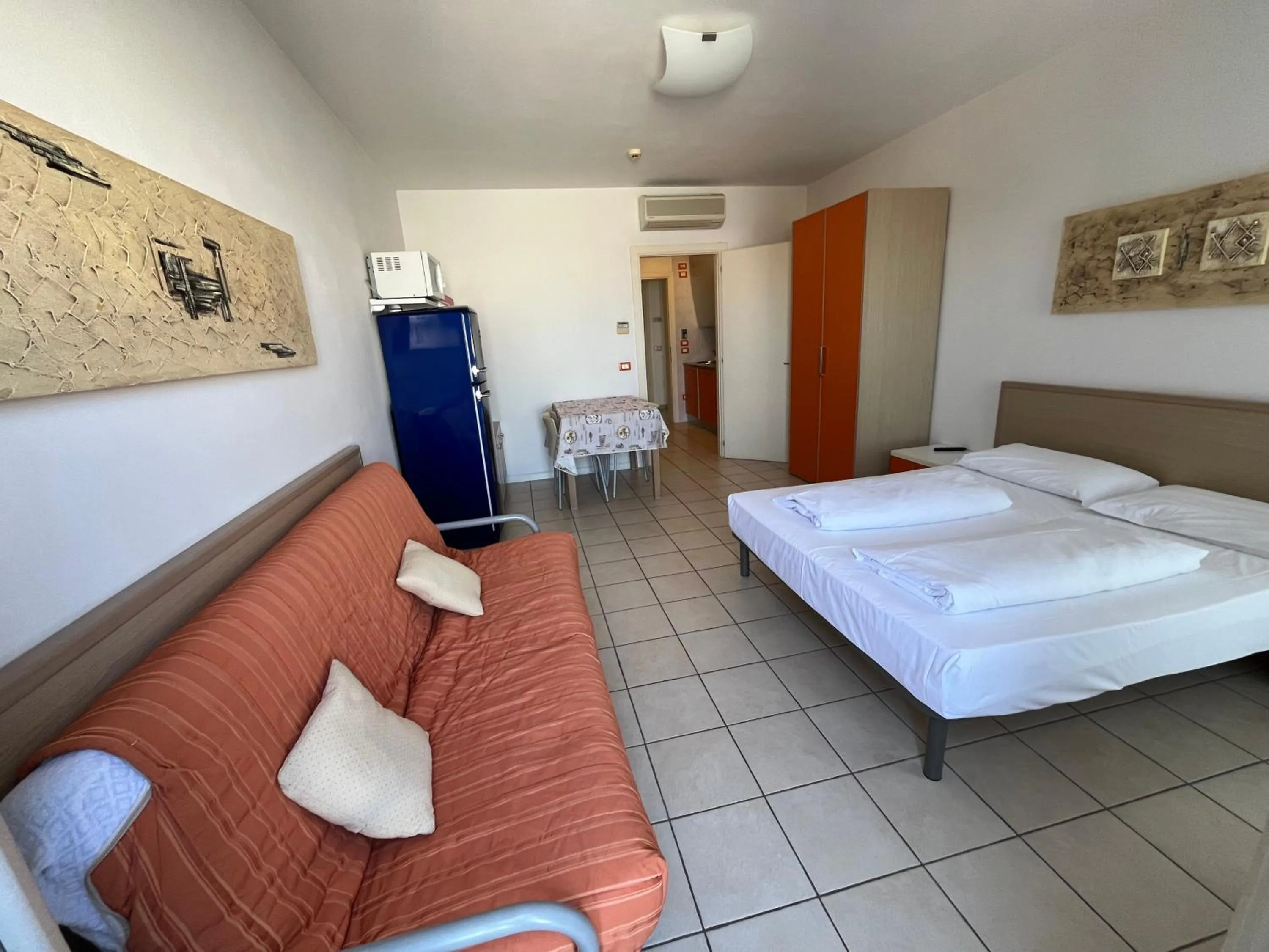 Bed in Villaggio Hemingway - Family Aparthotel