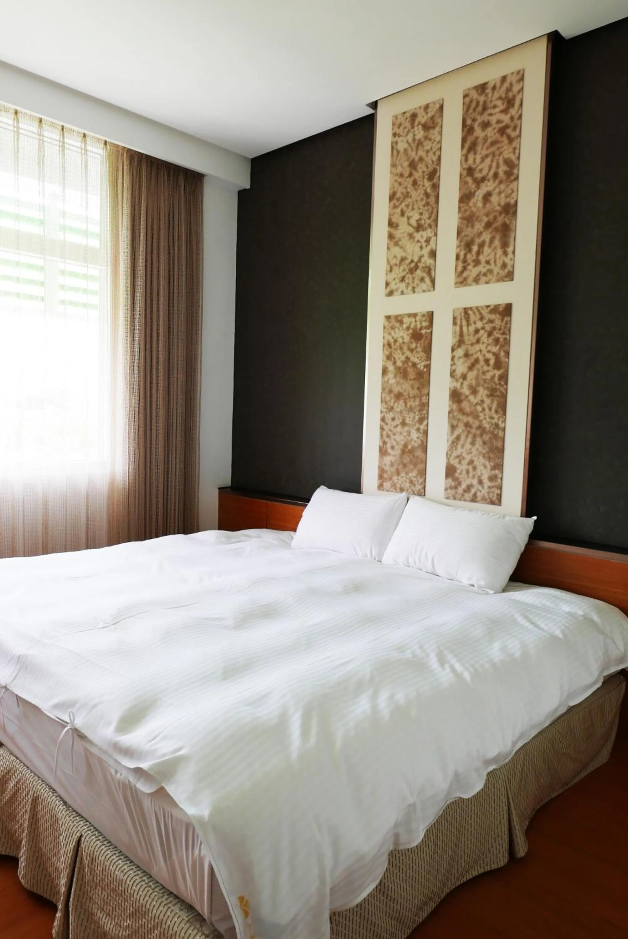 Bed in Zhi Da Craft Service Guest House