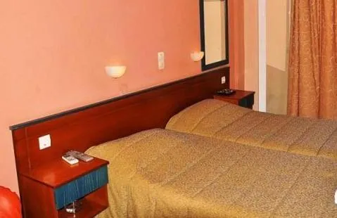 Bed in Hotel Pyrros