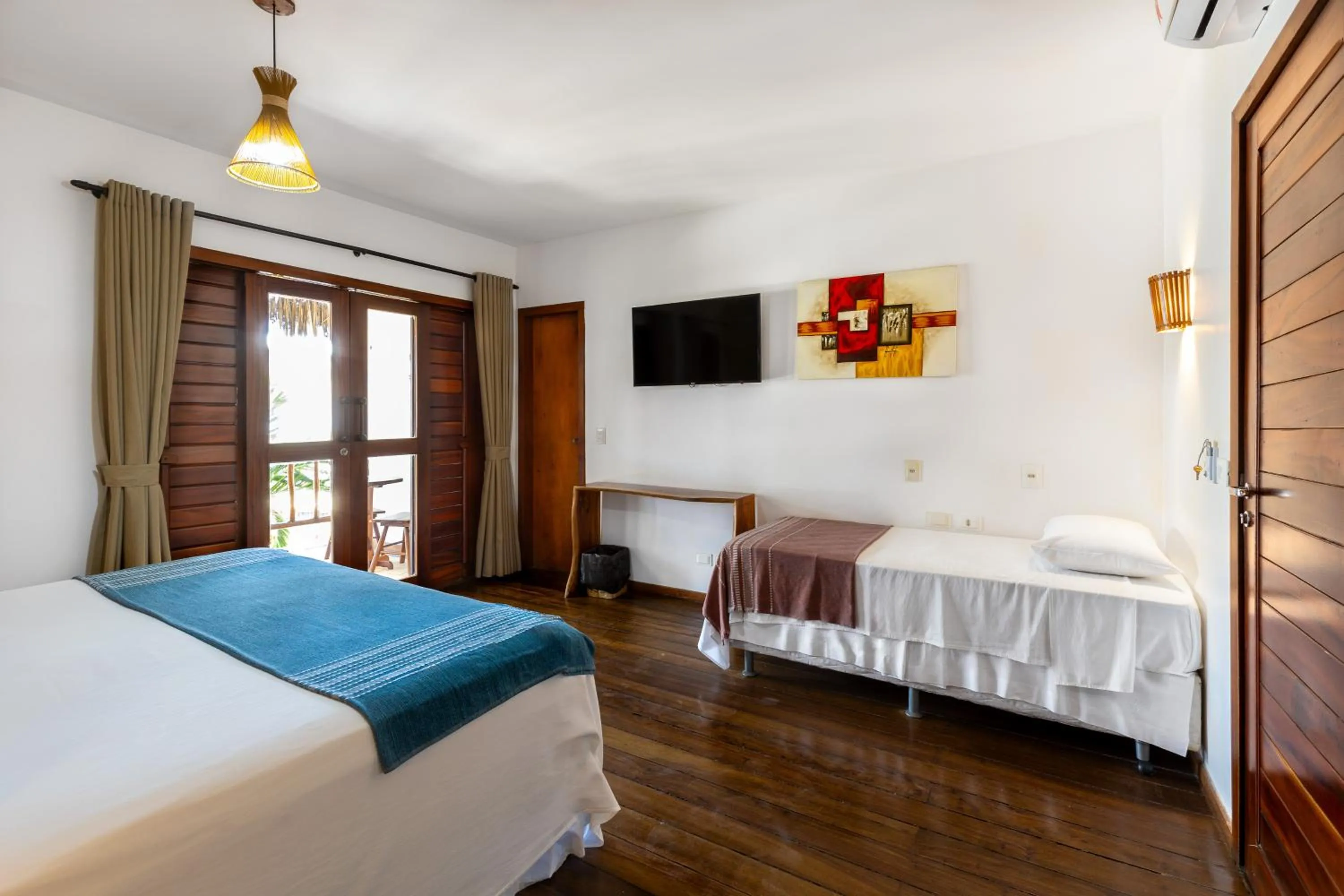 Bed in Vila Coqueiros Boutique Hotel