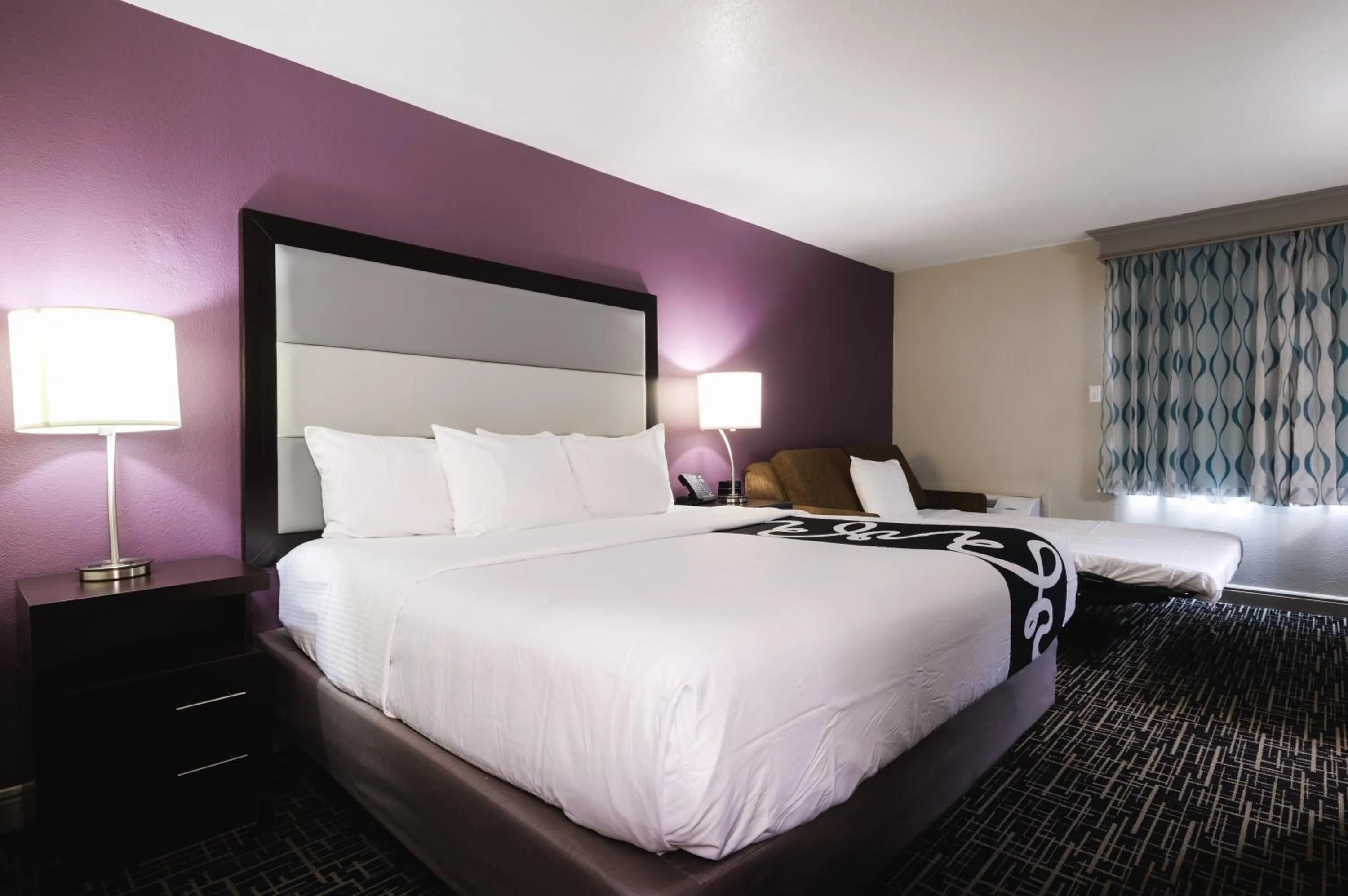 Bed in La Quinta Inn & Suites by Wyndham Fort Collins, Colorado