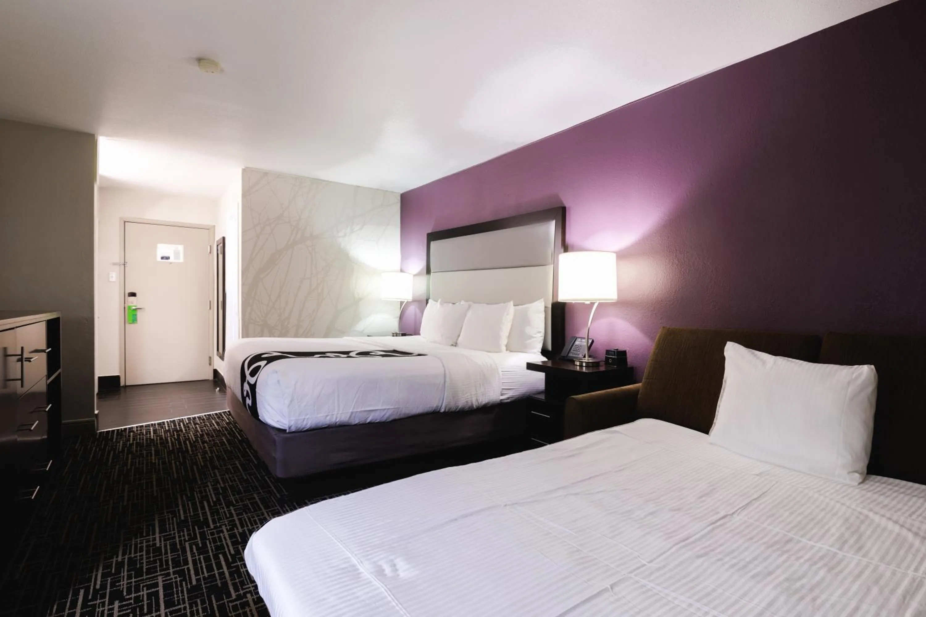 Bed in La Quinta Inn & Suites by Wyndham Fort Collins, Colorado