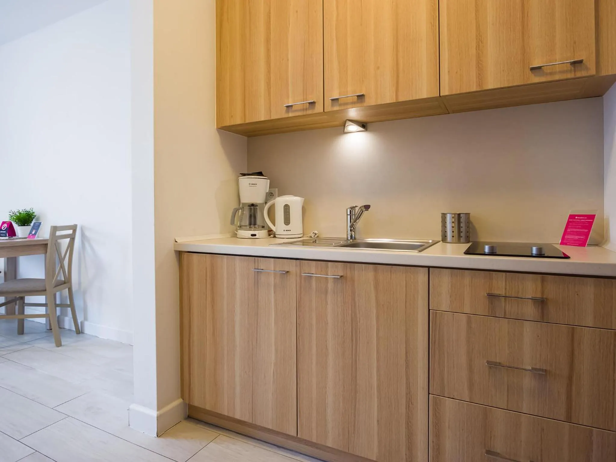 Kitchen or kitchenette in VacationClub - Aquamarina Apartment C-06