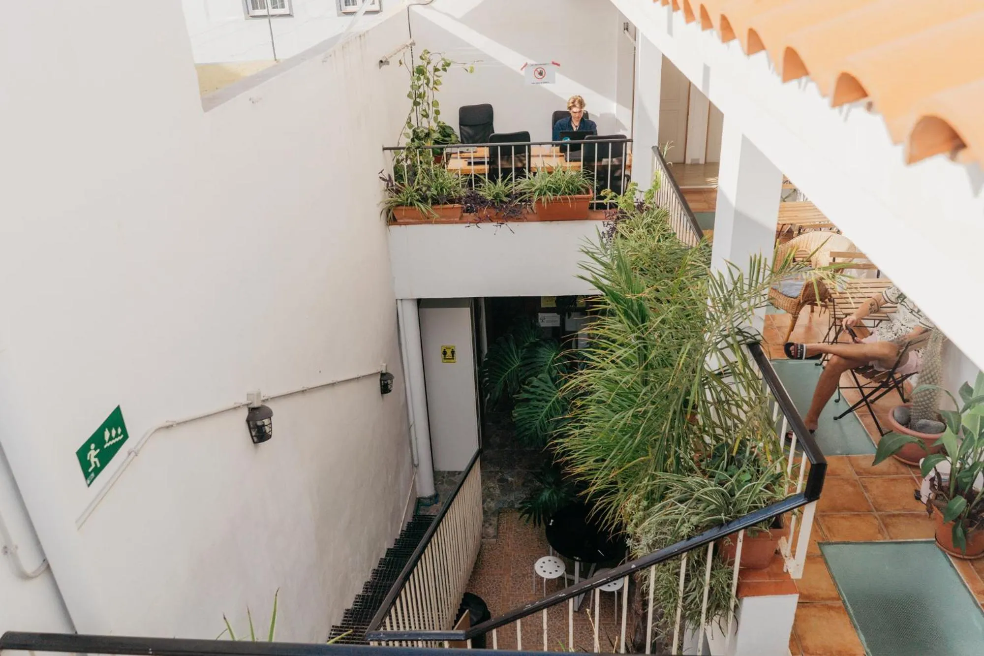 Communal lounge/ TV room in Puerto Nest Hostel