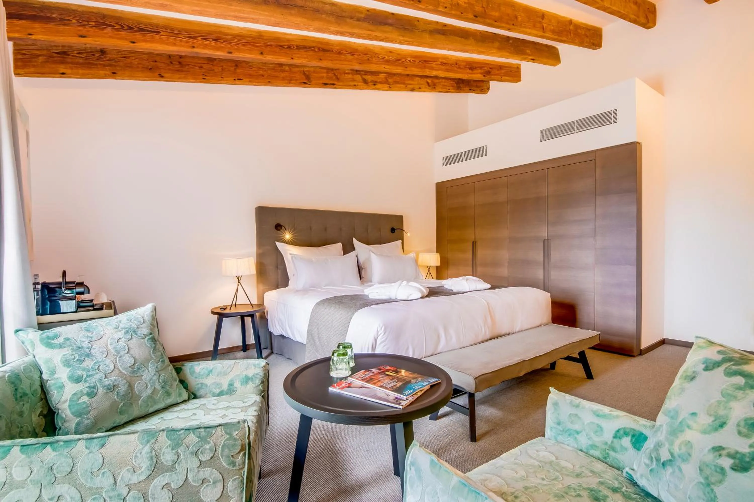 Seating area, Bed in Carrossa Hotel & Spa