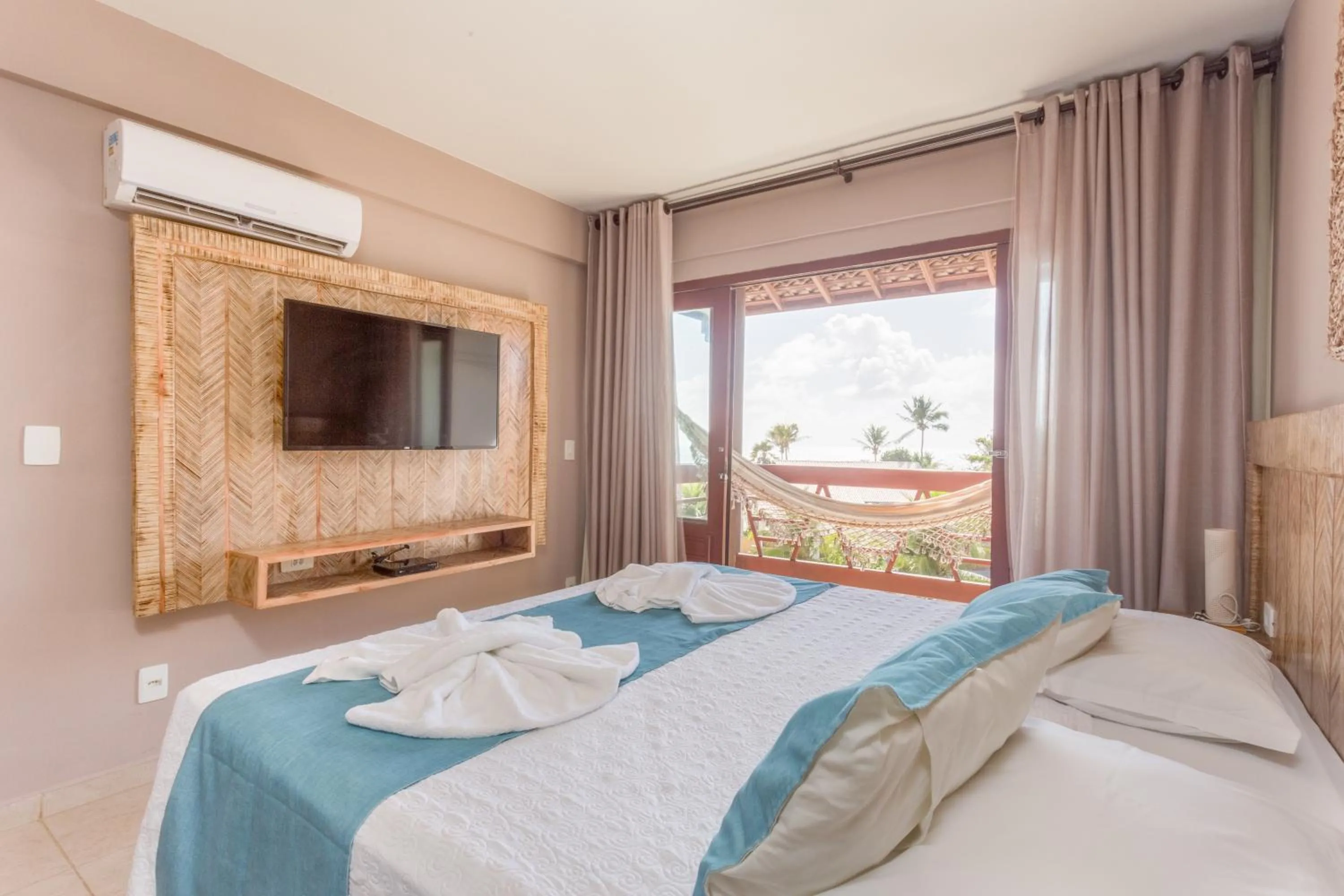 Bed in Pousada Iandê