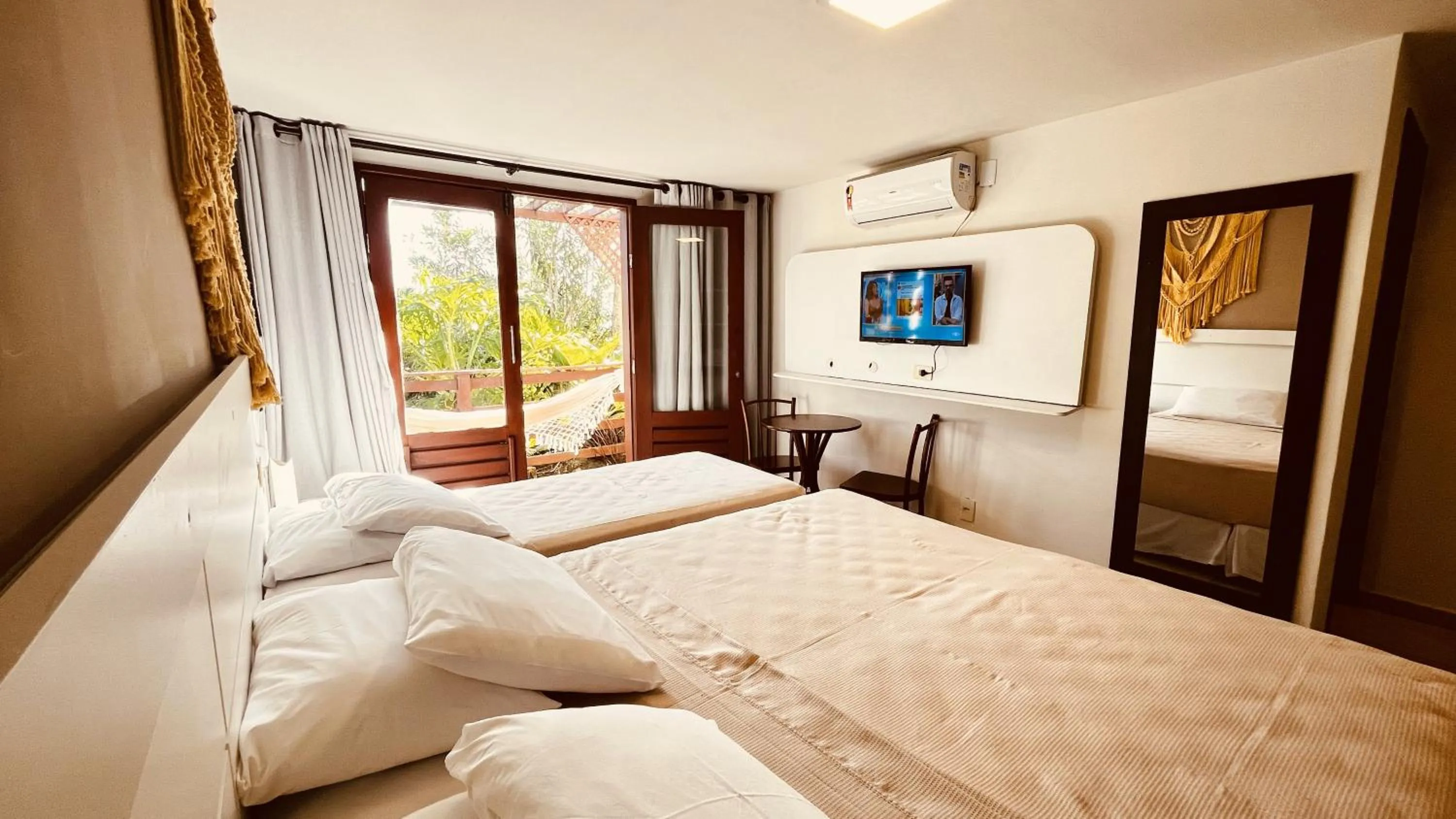 TV and multimedia, Bed in Pousada Iandê