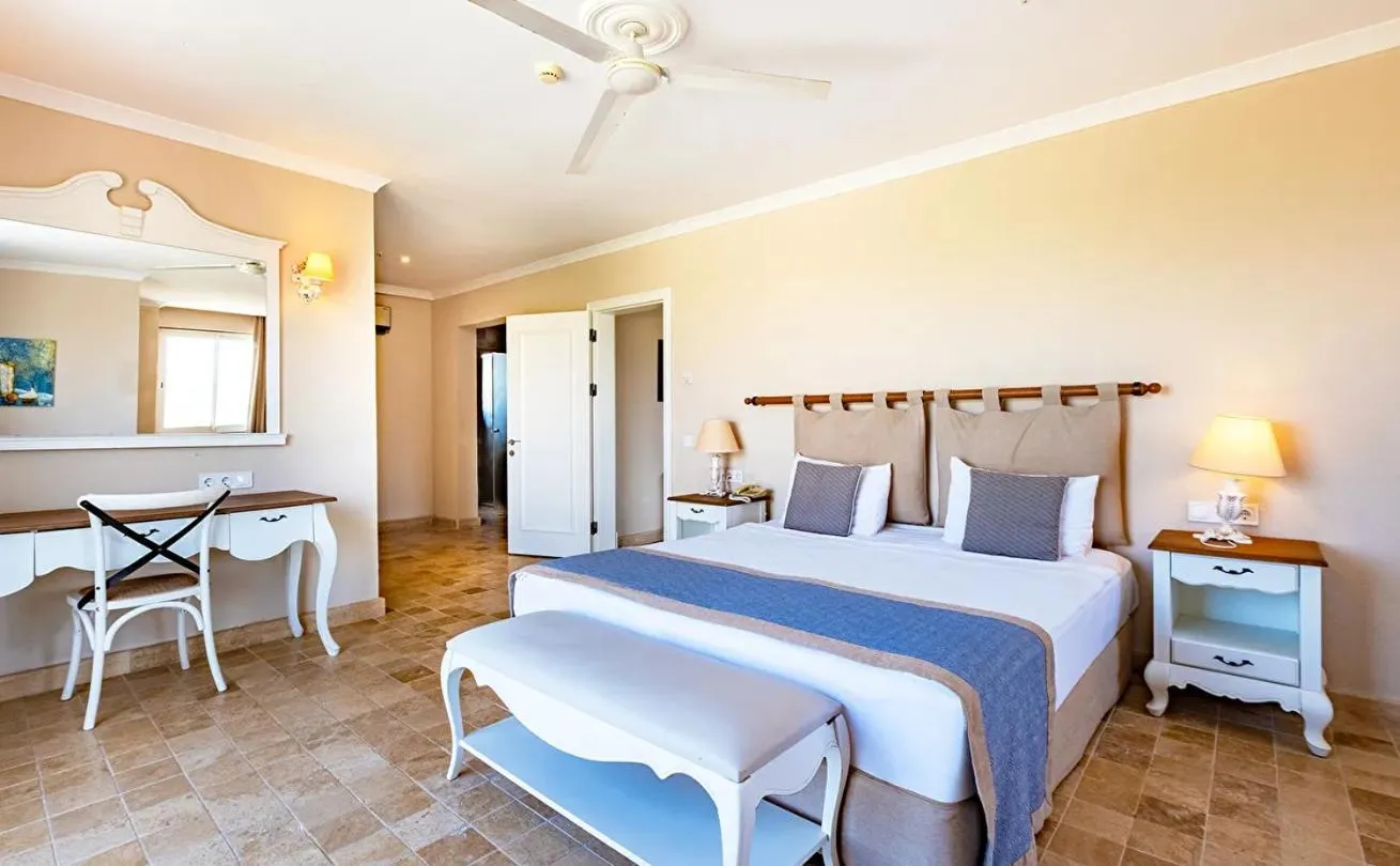 Bedroom, Bed in Andriake Beach Club Hotel - All Inclusive