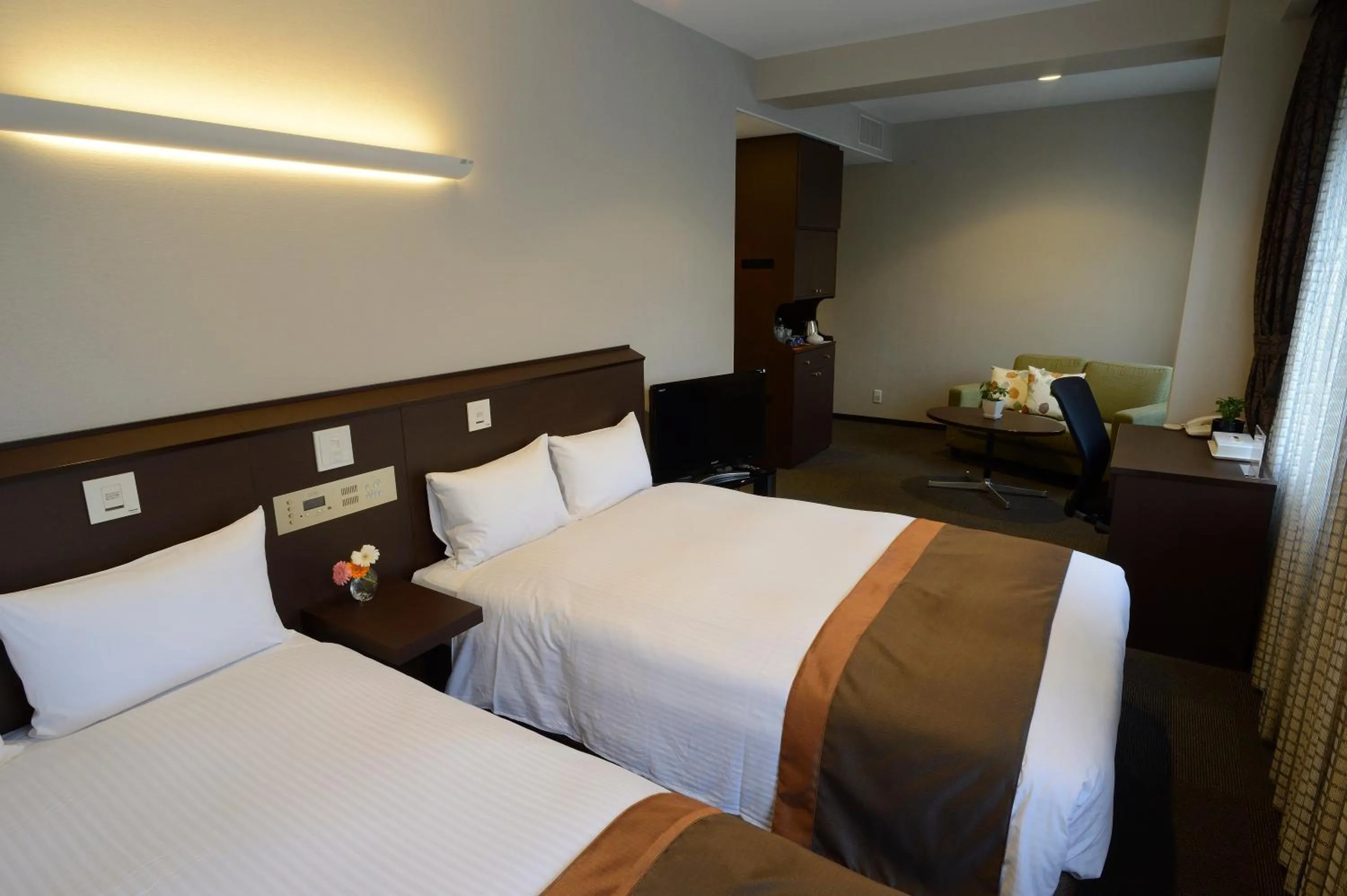 Photo of the whole room, Bed in Natural Hot Spring Midosuji Hotel