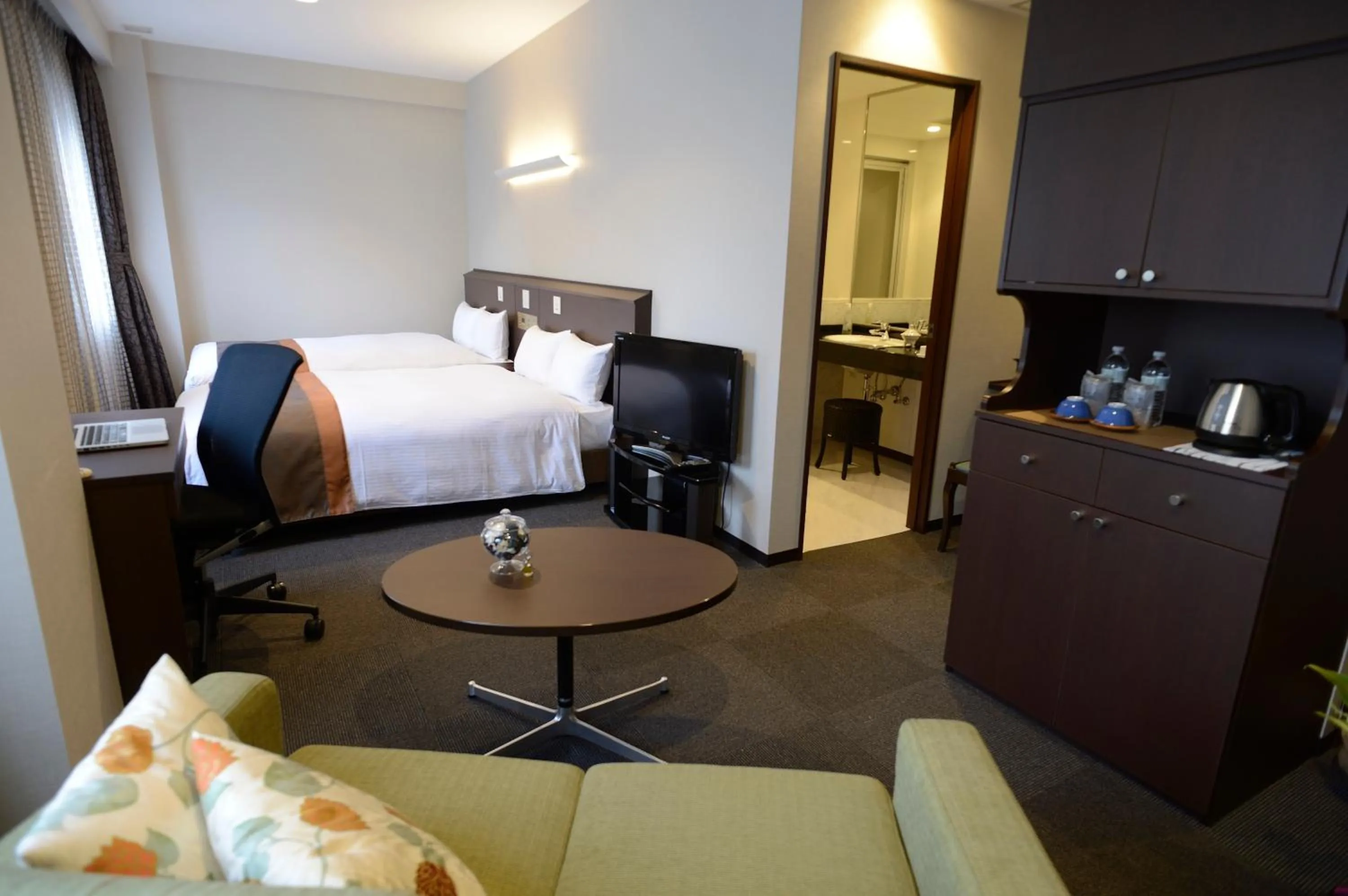 Photo of the whole room, Bed in Natural Hot Spring Midosuji Hotel