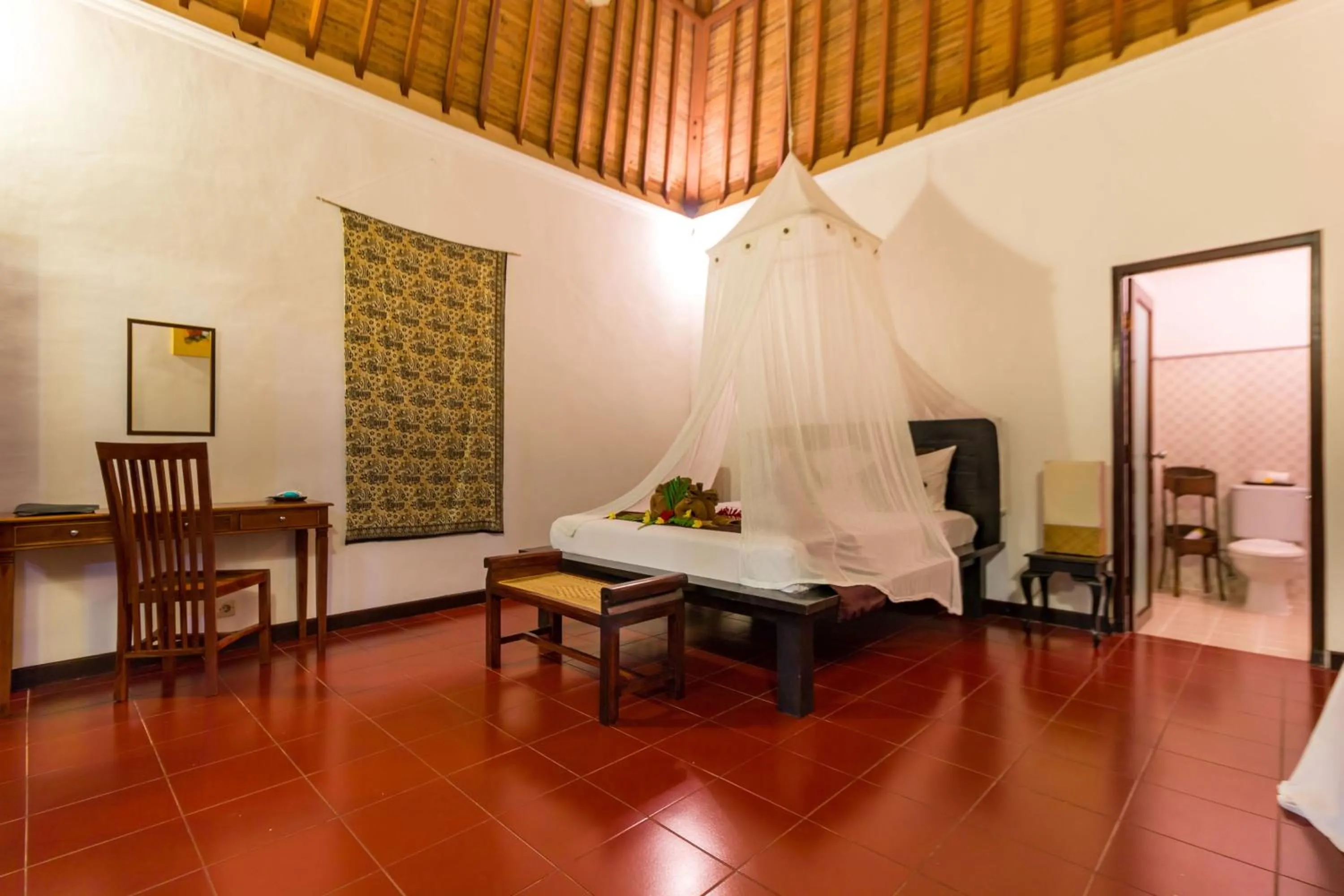 Bedroom in Tropical Bali Hotel