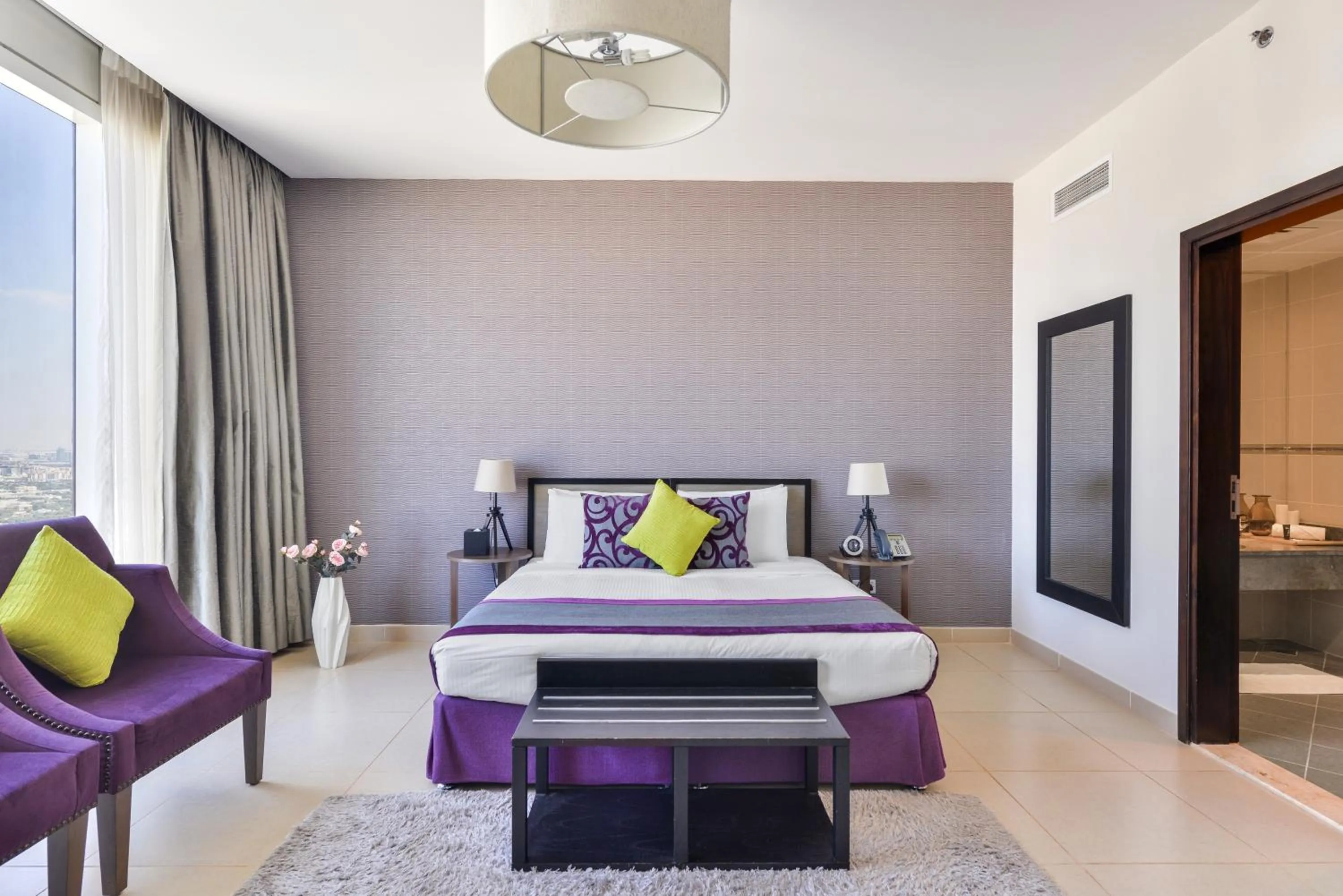 Bed in Nassima Tower Hotel Apartments