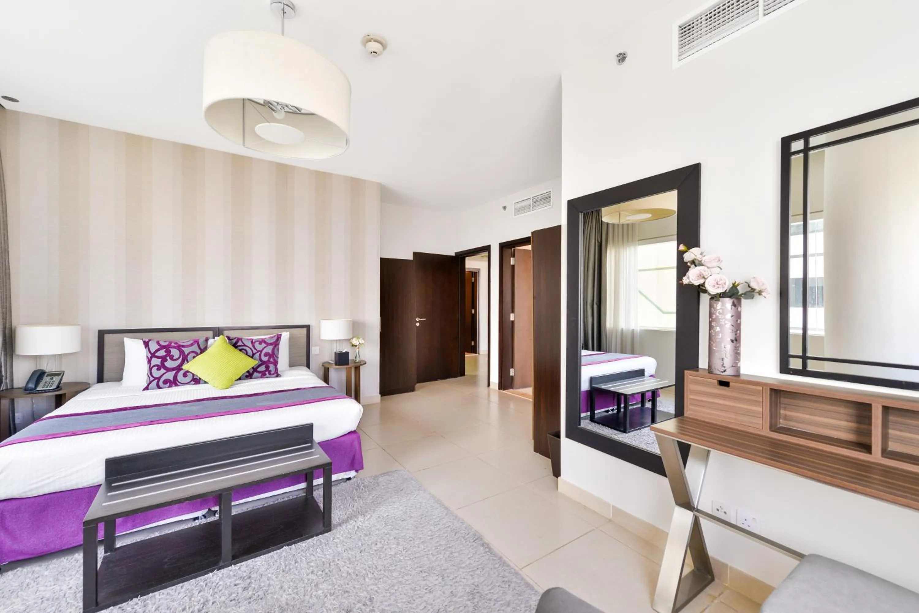 Bed in Nassima Tower Hotel Apartments