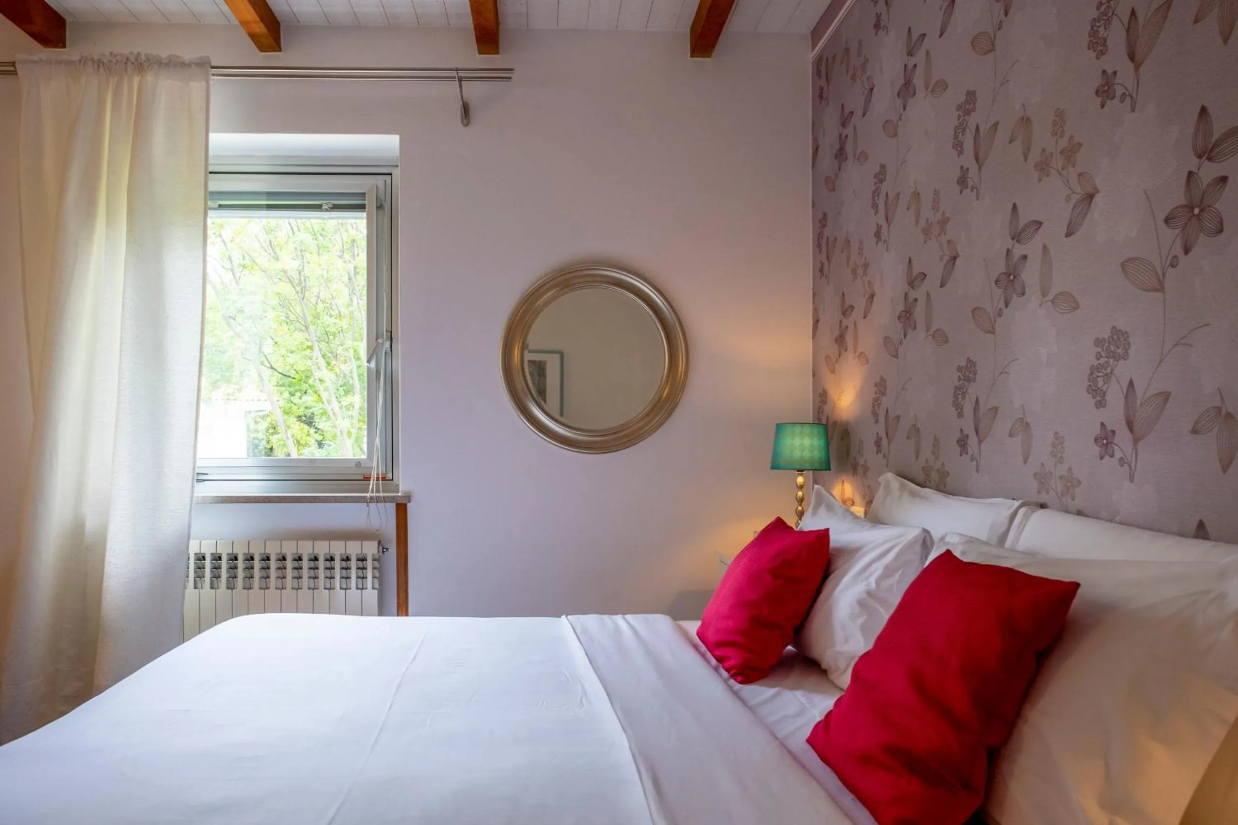 Bed in Villa Borgo Duino