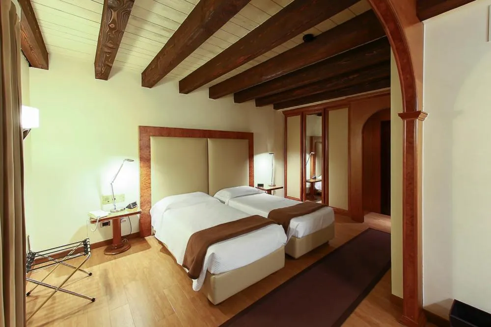 Bed in Relais Villabella Hotel