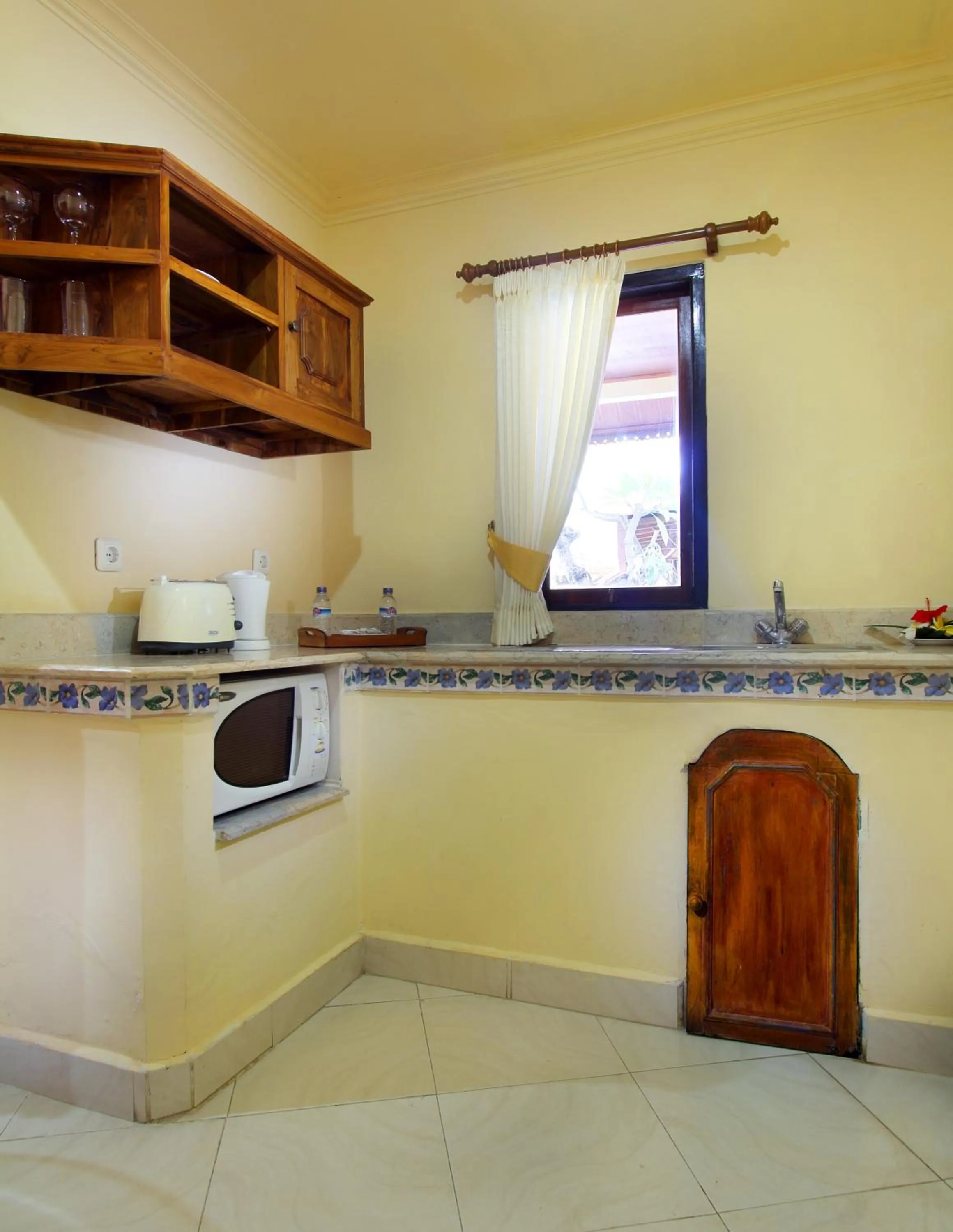 Kitchen or kitchenette in Bali Seascape Beach Club