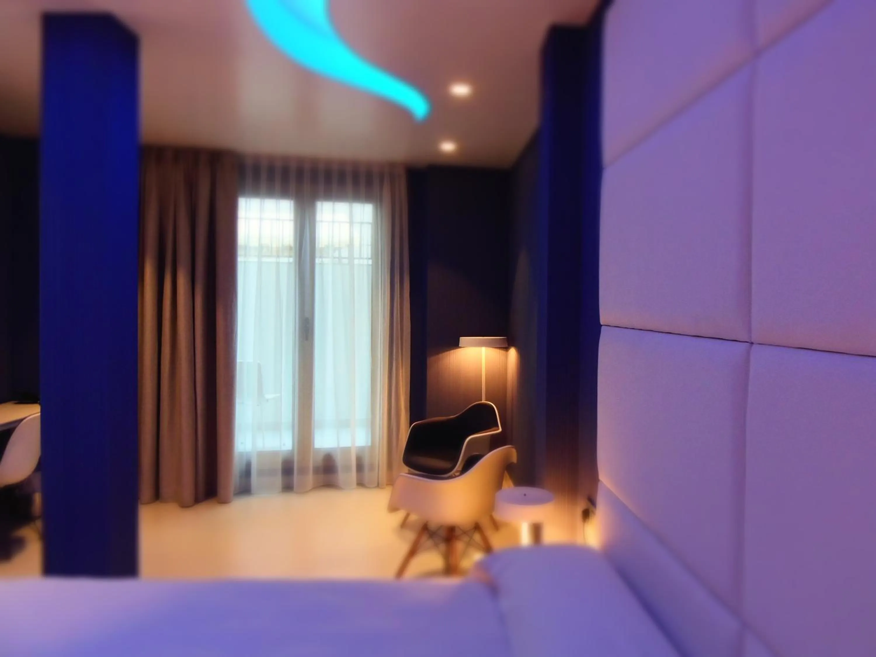 Living room, Bed in Hotel Boutique La Mar - Adults Only