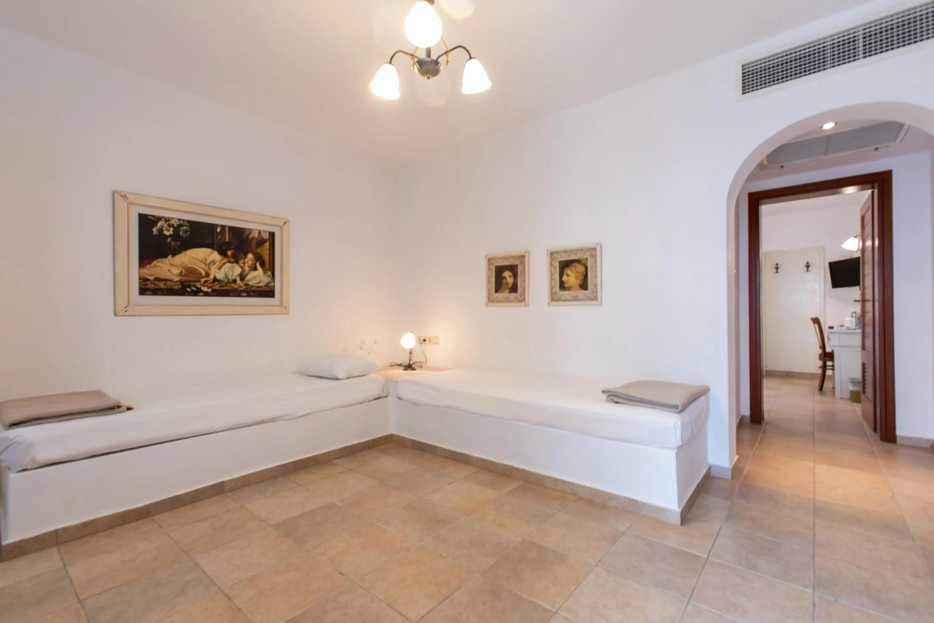 Bed in Plaza Beach Hotel