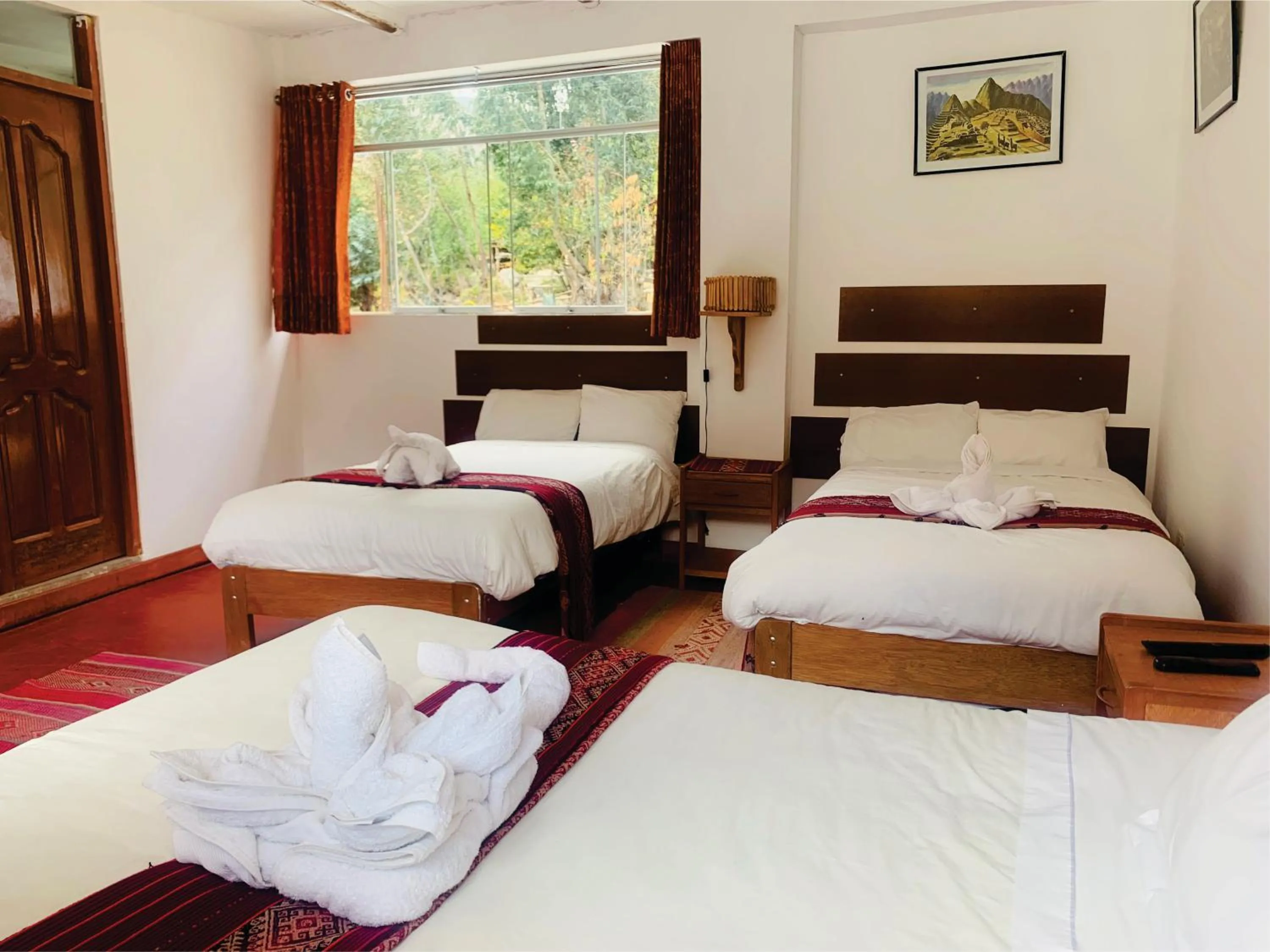 Bed in Inka Khawarina Tambo Lodge