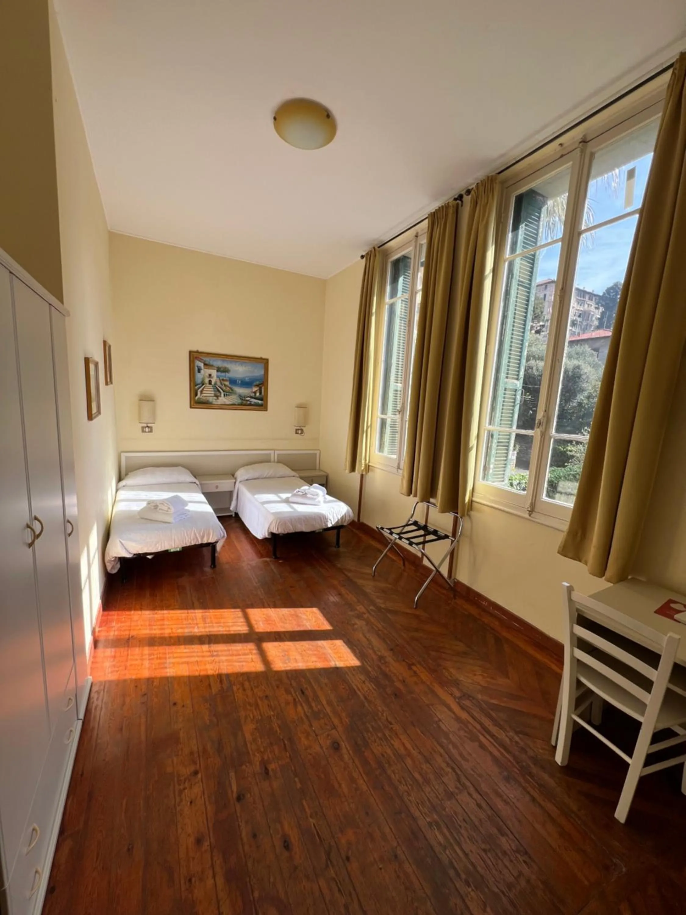 Bed in Hotel Petit Royal